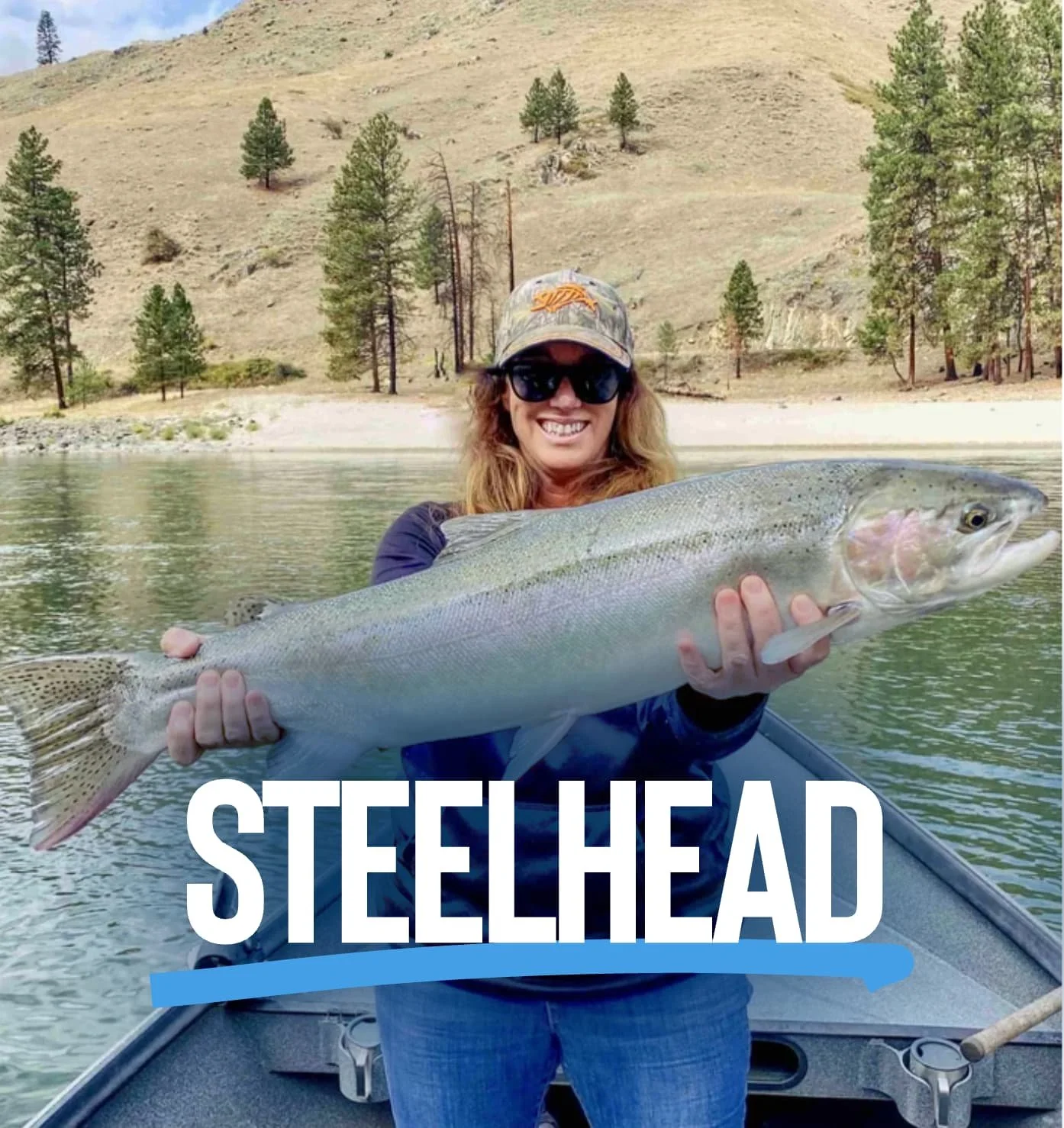 Woman holding a chrome bright B Run Salmon River Steelhead