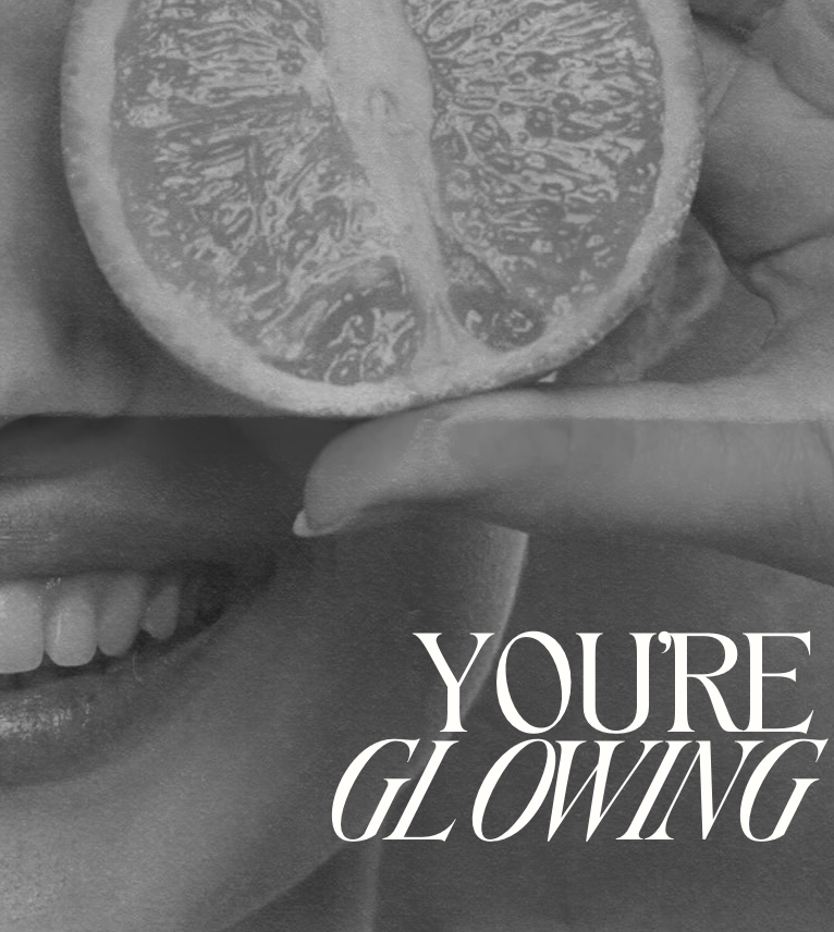 A person holding a lemon slice near their mouth with the phrase 'You're GLOWING' written in white text.