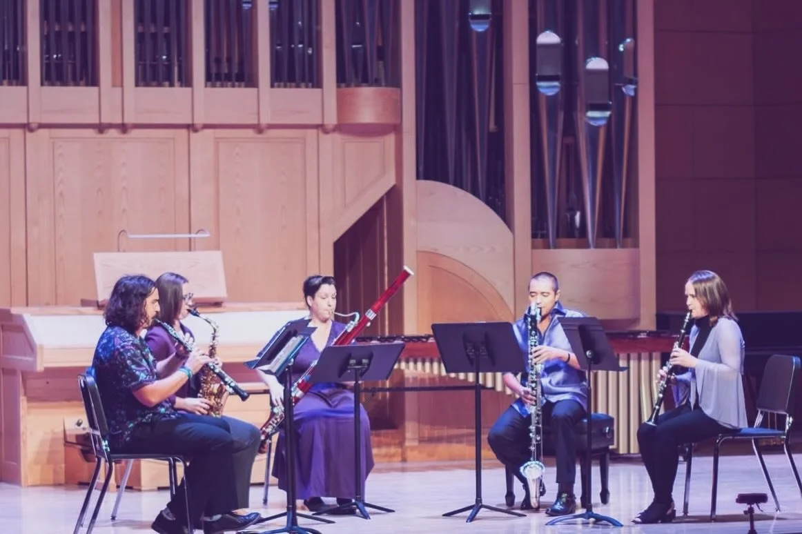 One of the few photos of our reed quintet performance. We wore purple, which I actually ended up liking. Just imagine me playing a C2 to a Eb5 over the course of a few measures (thank you, @matthew_triangle )

We will be performing this piece again s