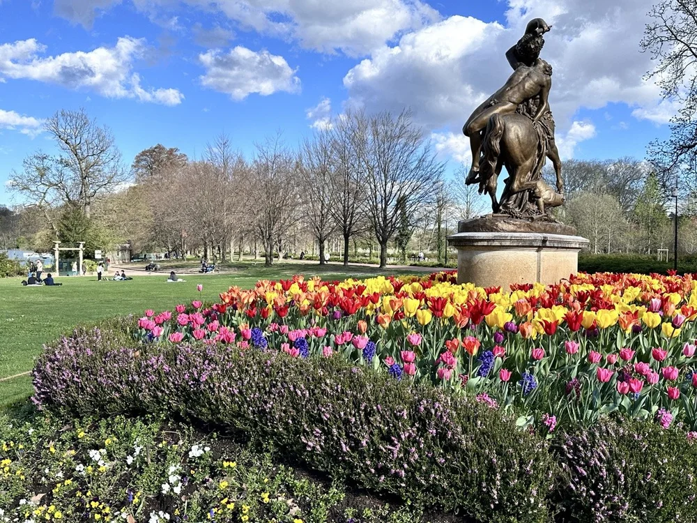 flowers and statue in the park Large.jpeg