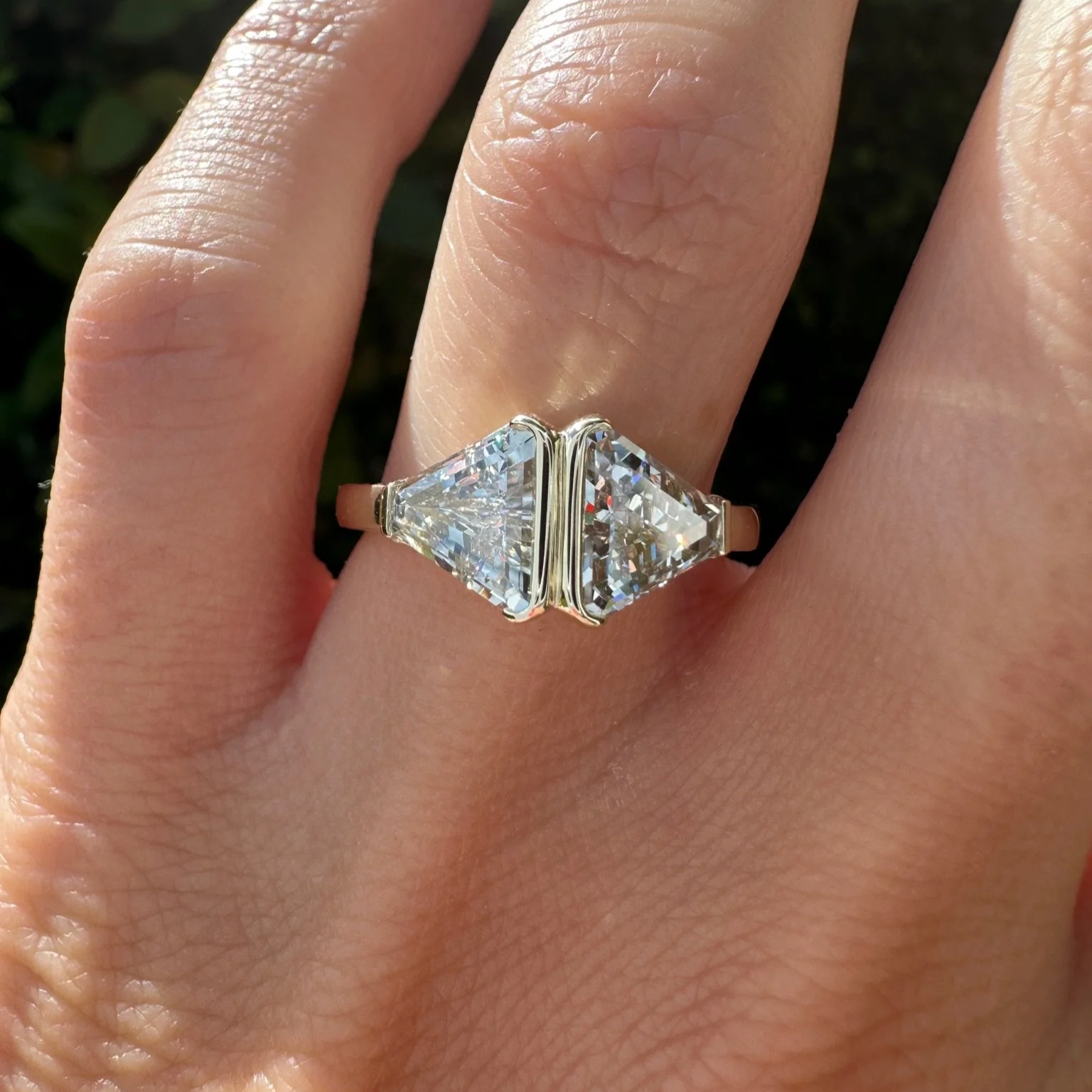 Toi et moi ring with two trillion-cut diamonds