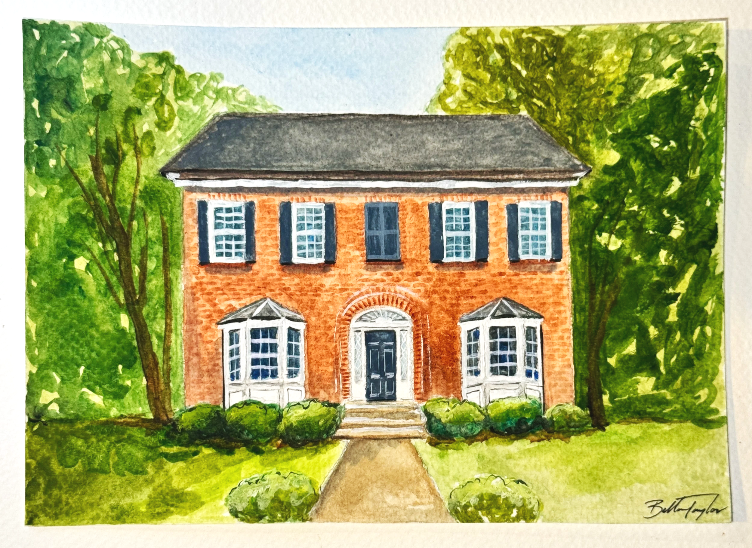 Watercolor painting of a red brick house with white windows and black shutters, surrounded by lush green trees and bushes, with a pathway leading to the front door.
