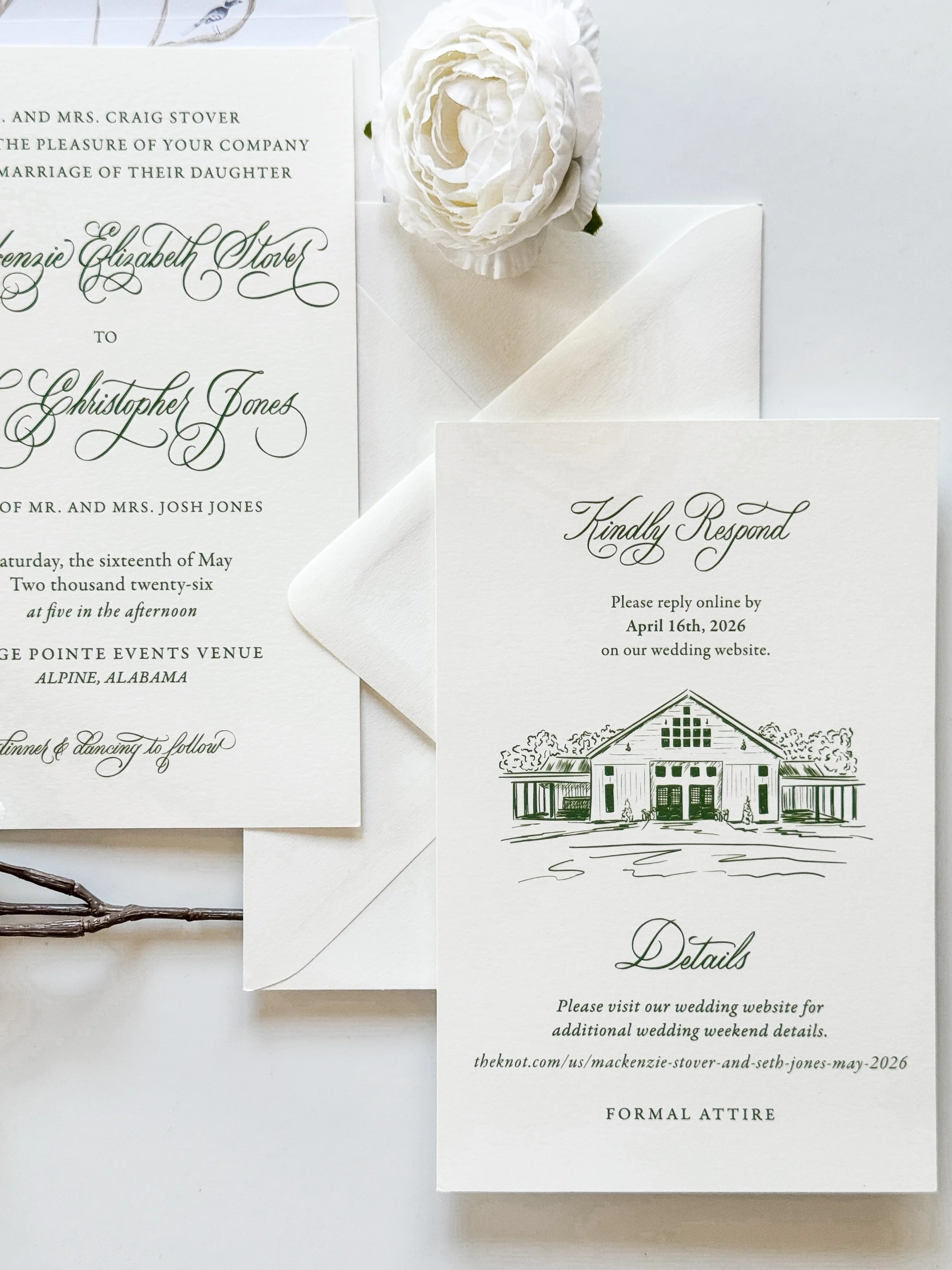 A wedding invitation set, including a main invitation card, RSVP card, and details card, with elegant cursive text and a building illustration, along with a white peony flower and a white envelope.