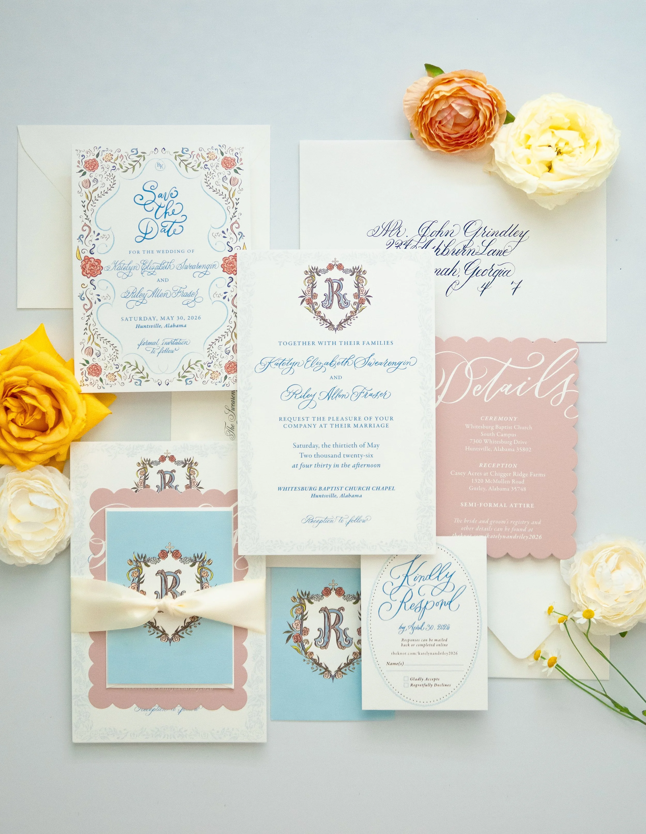 Wedding invitation suite including a save the date card, an invitation card, an RSVP card, and a reception card, arranged with yellow and white roses on a white background.