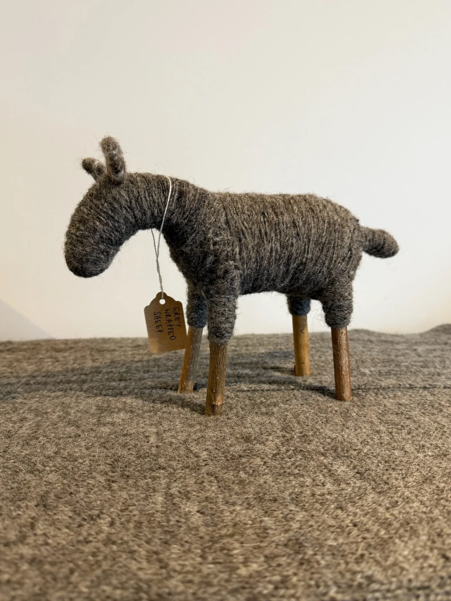 Grey Wrapped Sheep by Mairi Hedges