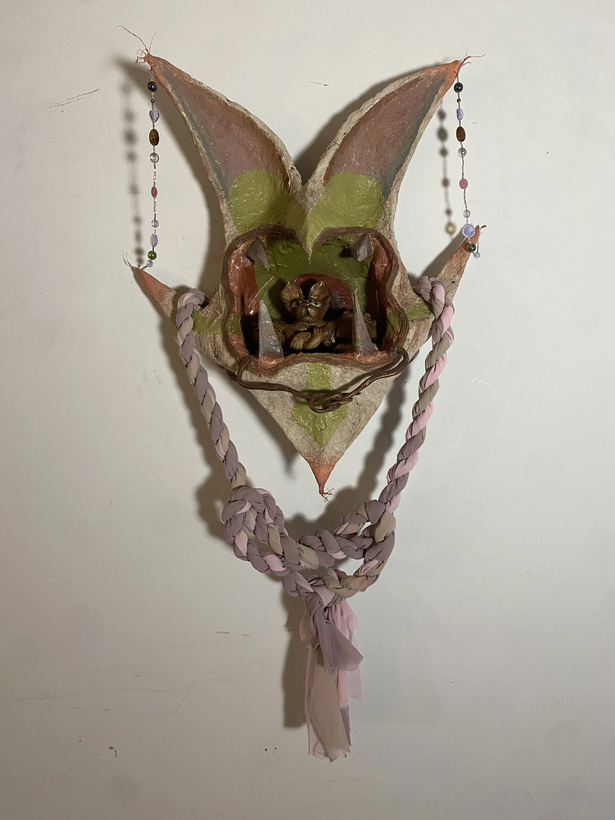 "The Maw of Mire" Ceramic figurine, hand twisted rope, beaded string, paper pulp, acrylic, and papermache on carved wooden cigar box. 26 x 16 x 10"