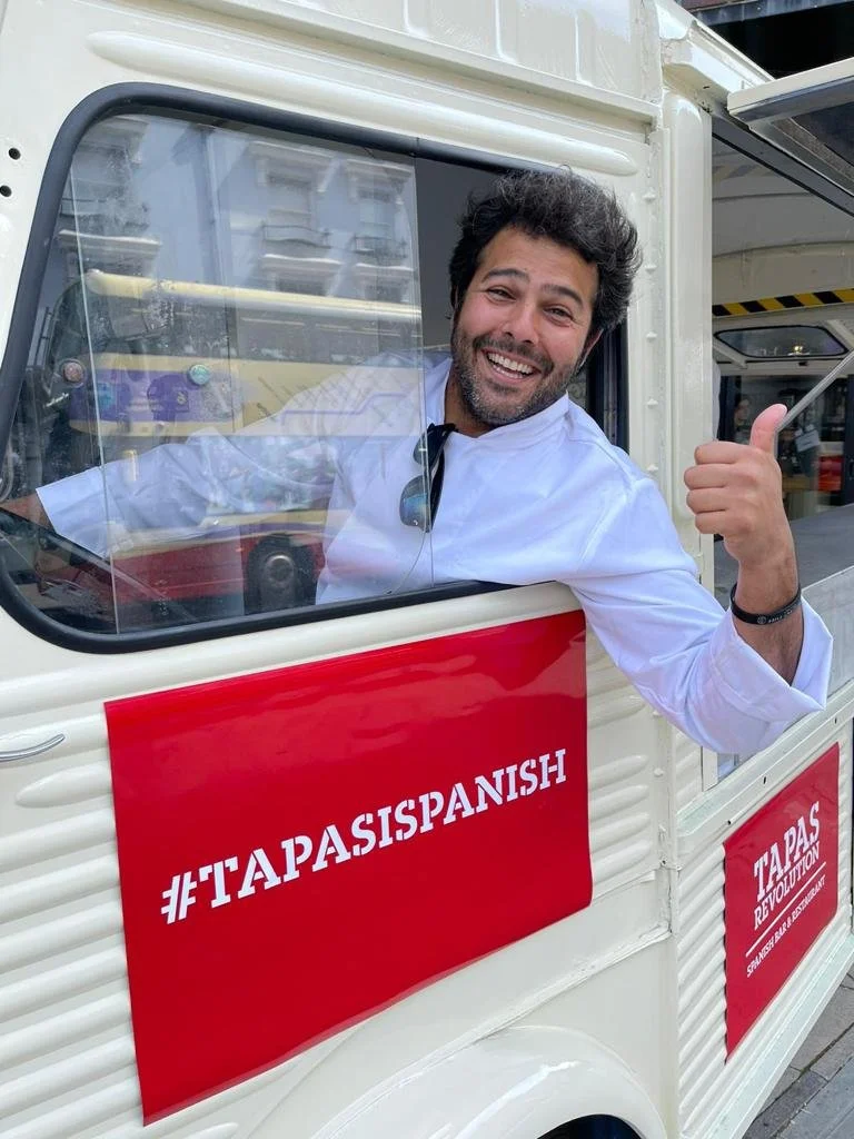 A branded Citroën HY van serving tapas in Brighton at a branded street activation for 'TAPAS REVOLUTION'.