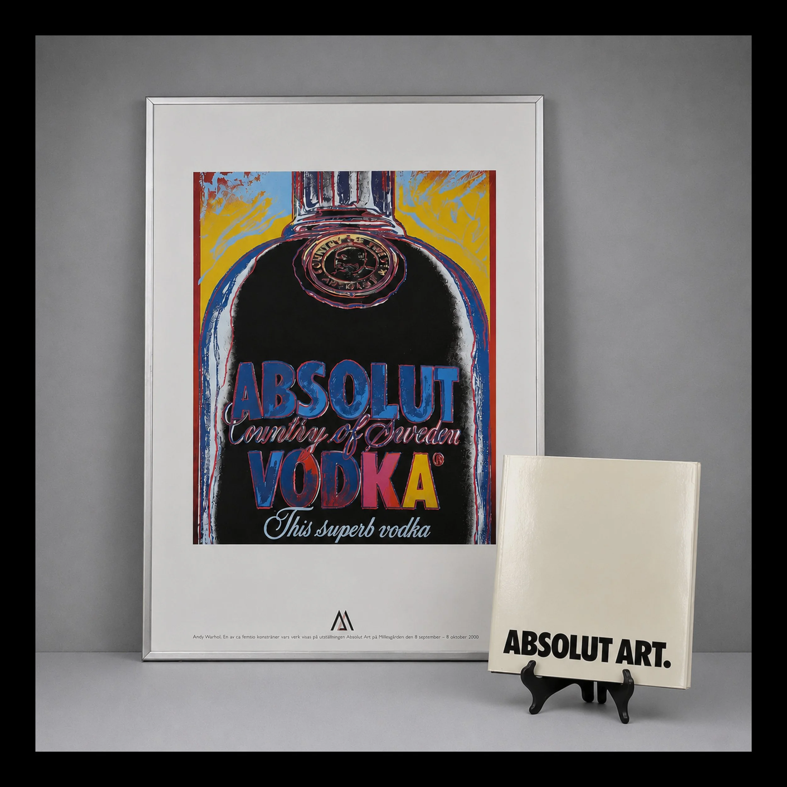 Vernissageaffisch och bok för Absolut Vodkas konstutställning Absolut Art.