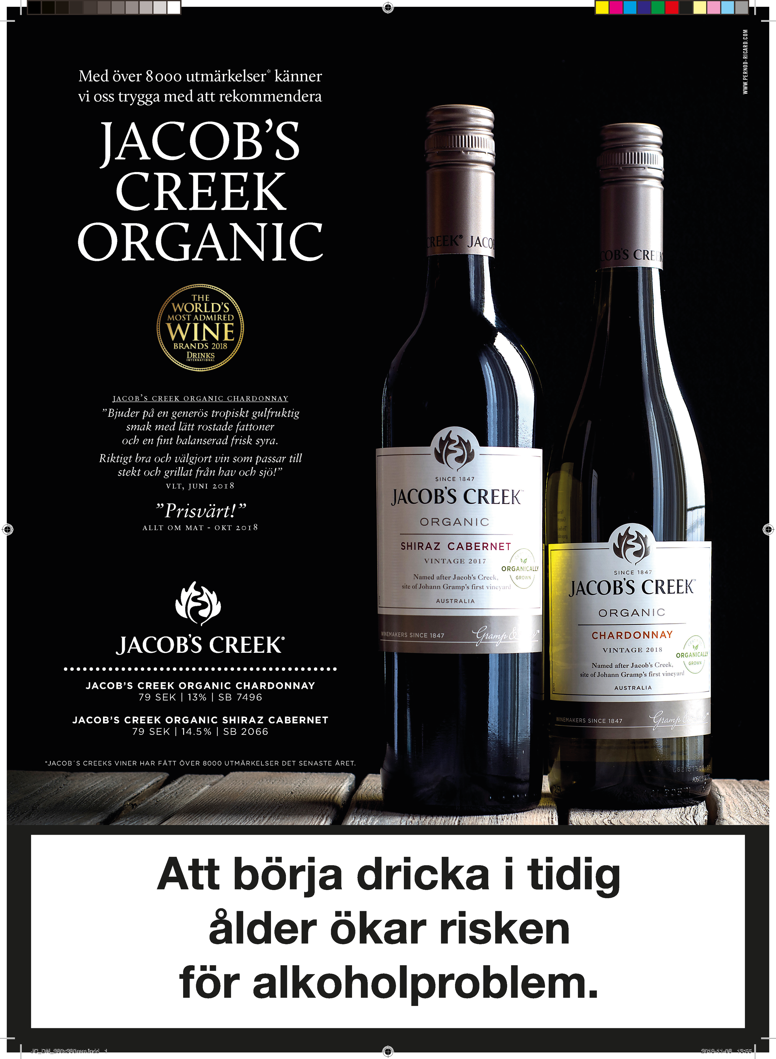 Reklam för Jacob's Creek ekologiska viner, med två flaskor, en Shiraz Cabernet och en Chardonnay, samt text om vinets egenskaper och priser. Text om att tidig alkoholkonsumtion ökar risk för alkoholproblem.