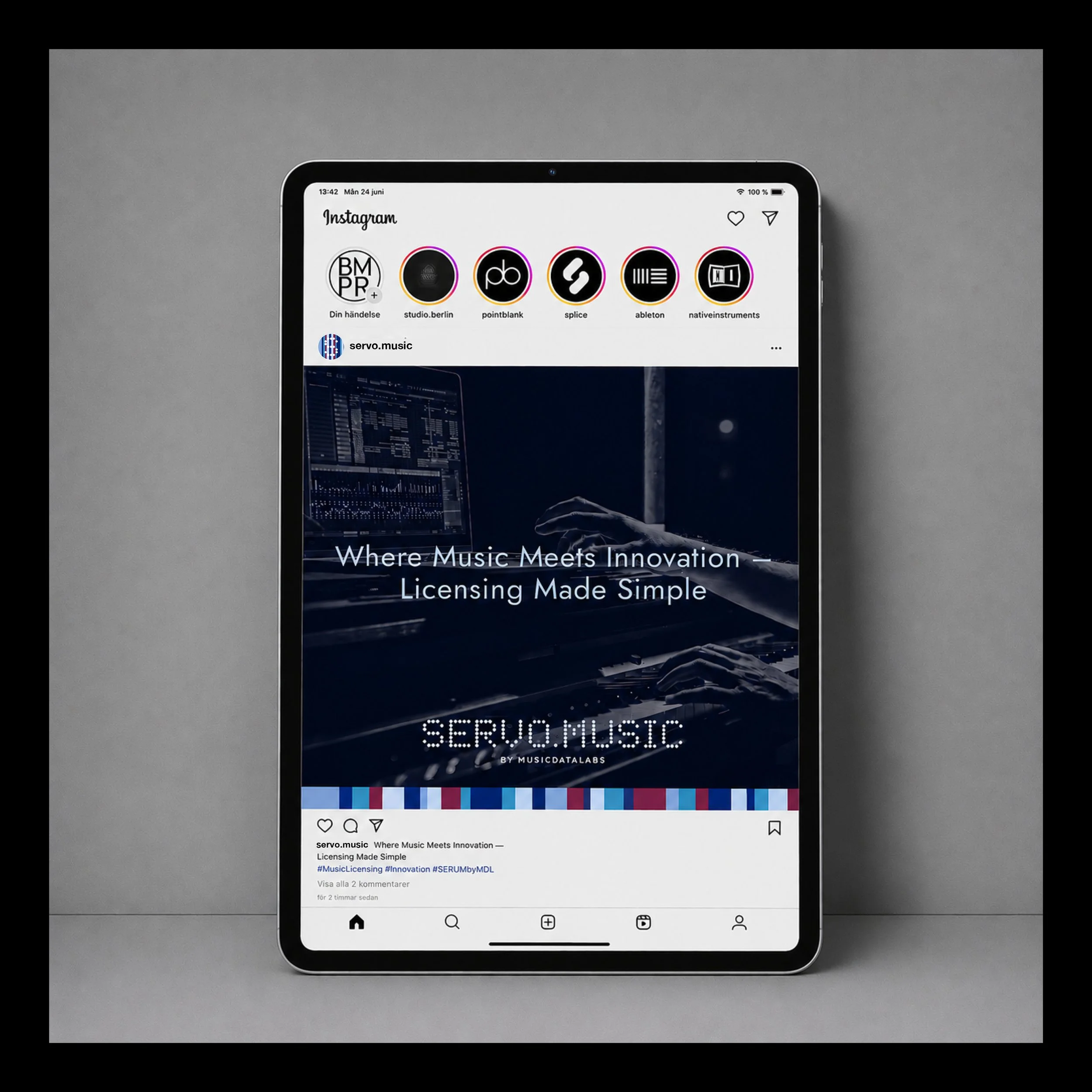 Design av instagraminlägg för företaget Music Data Labs på en iPad