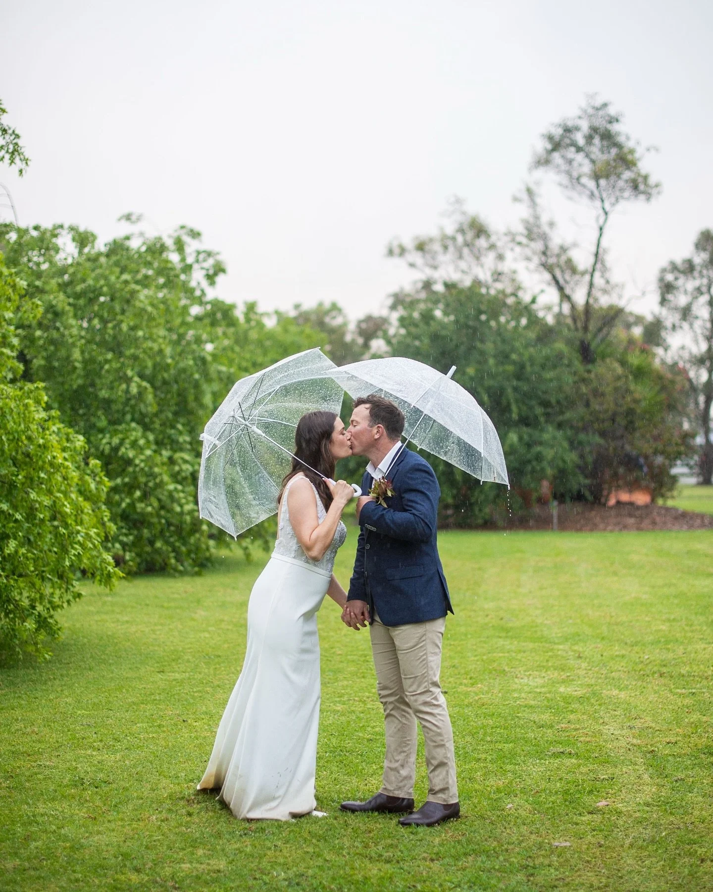 Mr and Mrs Bradley ☂️
Yeah it might have rained for the whole day - but I can&rsquo;t find a photo where people are any less than overjoyed with the celebration of Ash + Mitch yesterday!  Umbrellas, tractors, fires and boots - the only things require