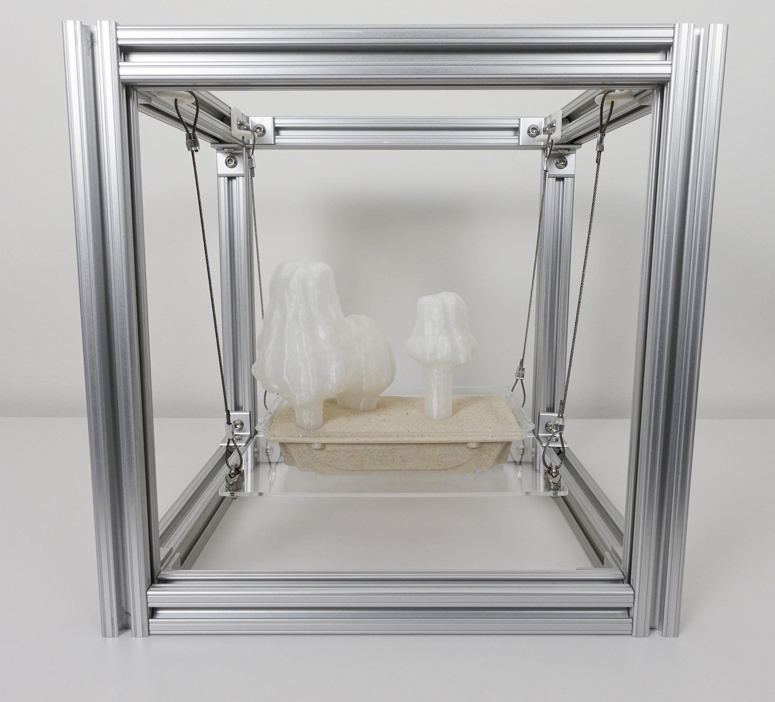 Mycosynthus Robusta, 2025. 3D printed polylactic acid, recycled polyethylene terephthalate, aluminum extrusion, steel cable, acrylic, sand, 12 x 12 x 12 in.