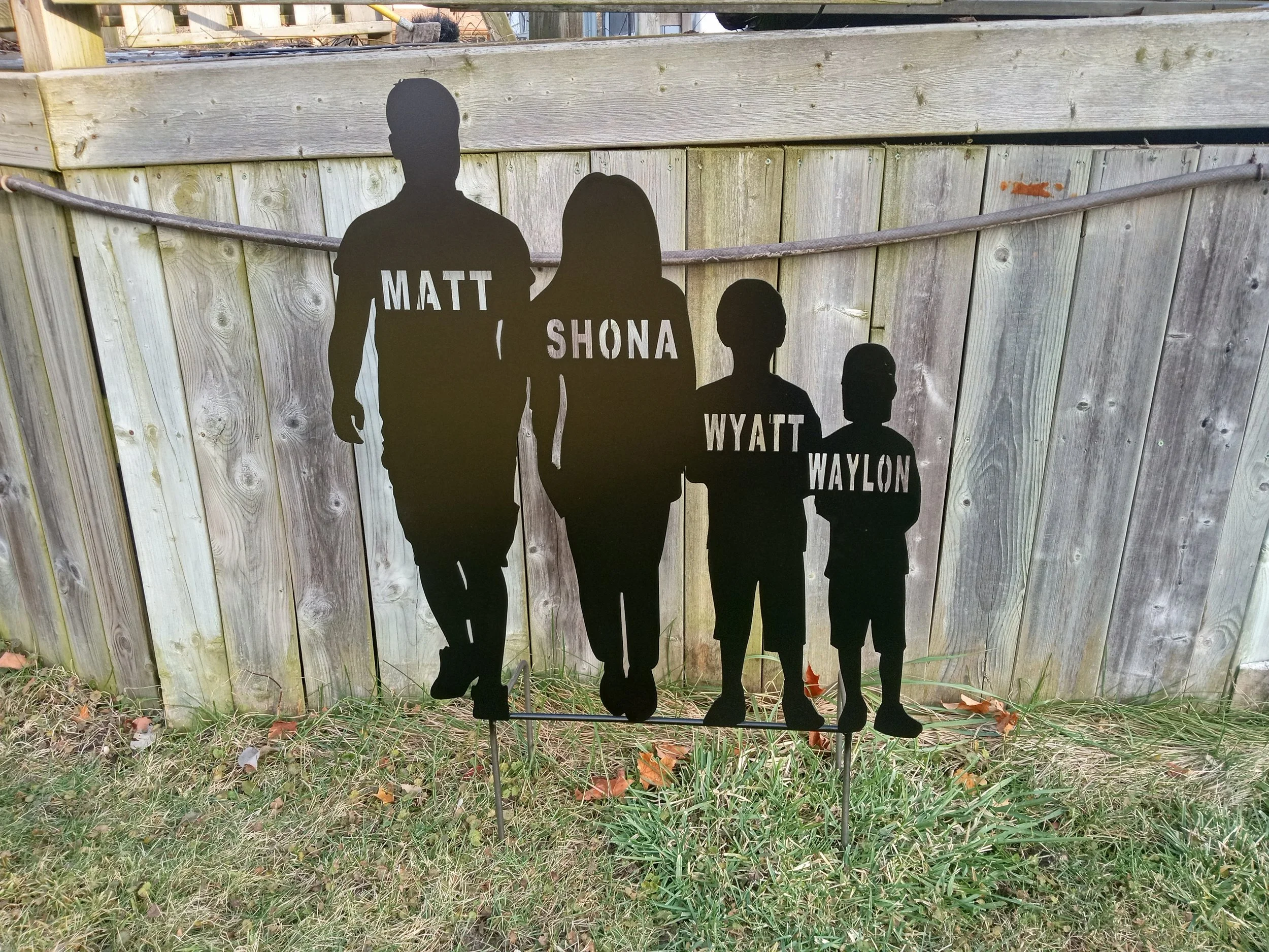 4 family member lawn ornament