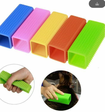 Pet hair brush for removing hair from seats and carpets