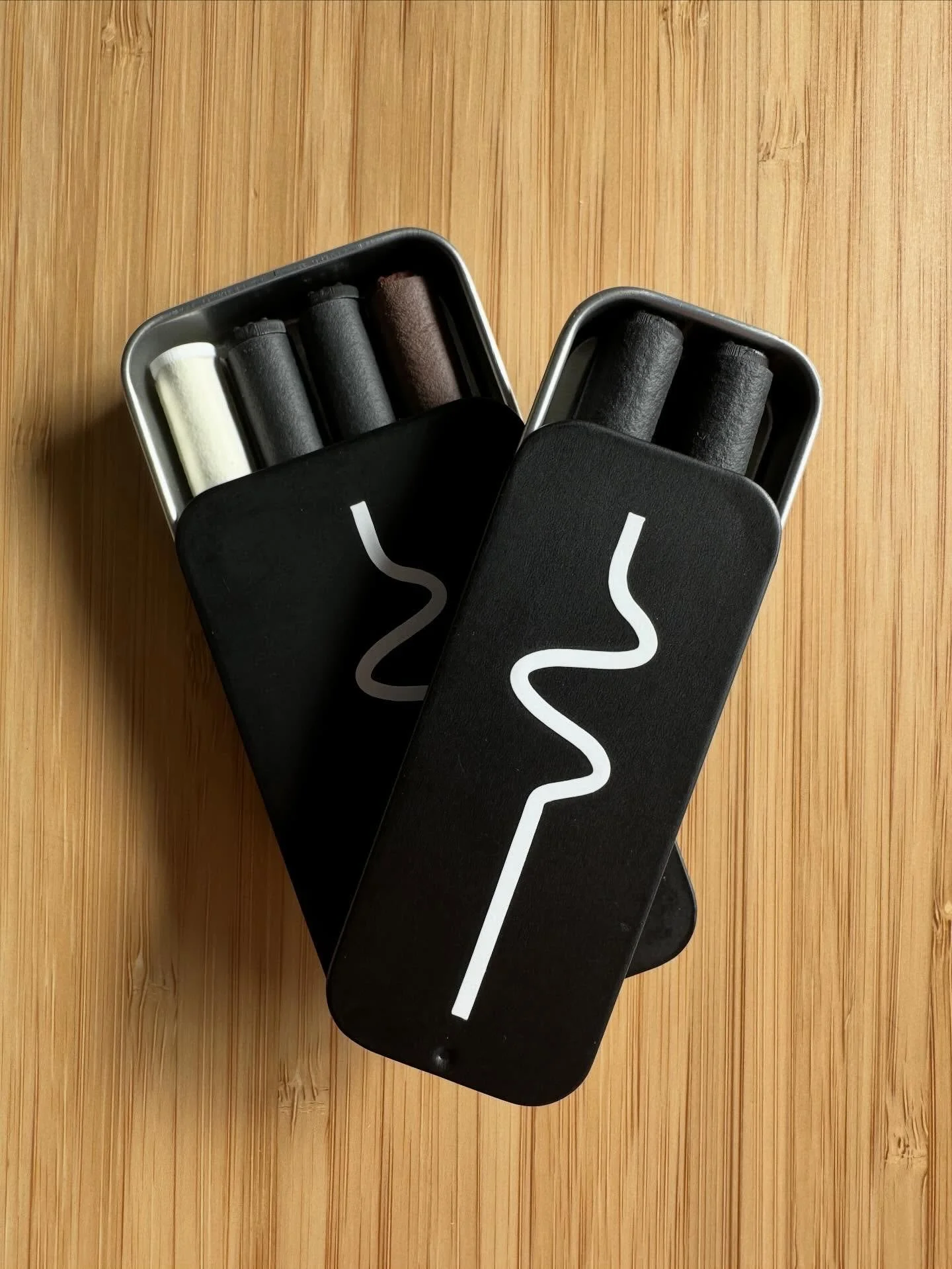 the dead ringer just hit 750 backers (!!)
and just unlocked the next stretch goal &mdash; slide-top cases.

matte black. logo-stamped. built to travel.
available in two sizes &mdash; mini (1&ndash;2) and standard (up to 4).
add-ons and new bundles li