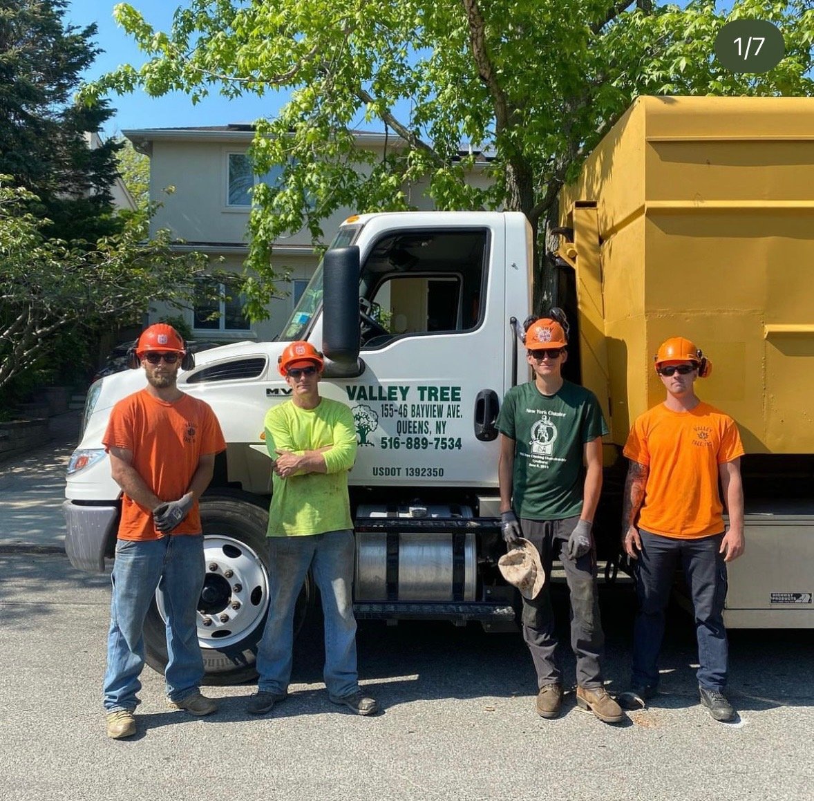 Valley Tree and Landscape Service Inc team in front of truck.