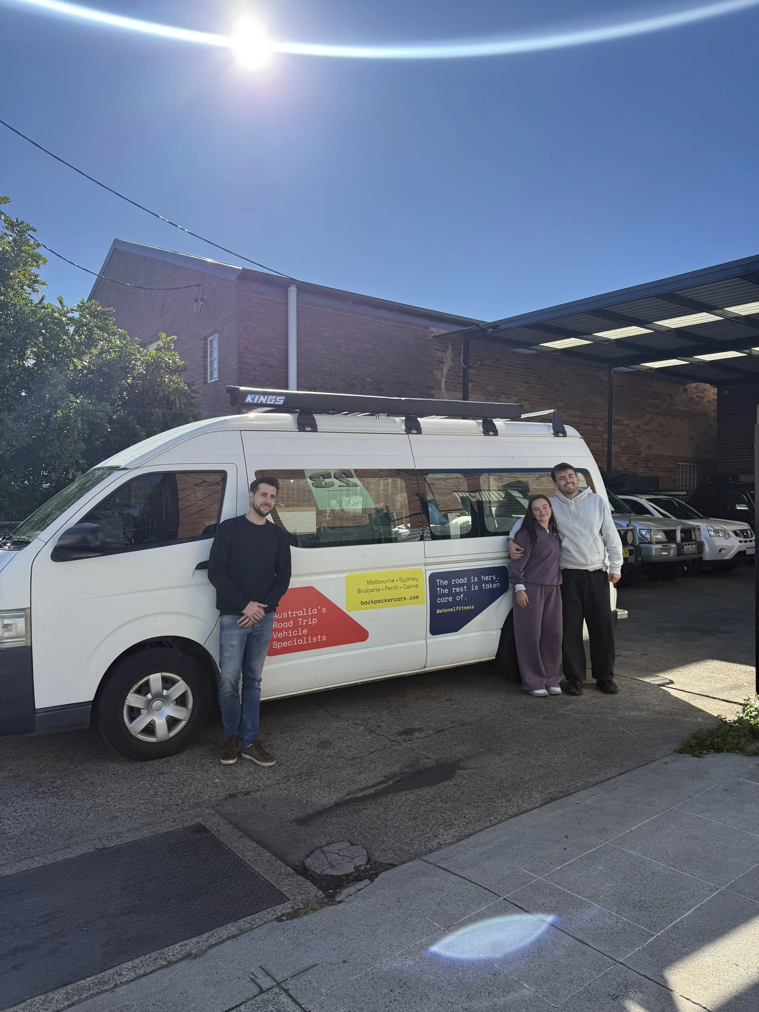 BCA employees and Shonel Daniels with her vehicle provided by BCA
