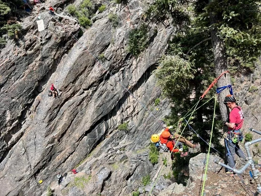 On May 9th a climber on the downstream route of the Ouray Via Ferrata was unable to continue and unable to reverse the route. Two OMRT members made contact with the climber and it was decided to perform a raise utilizing a high directional on a tree 