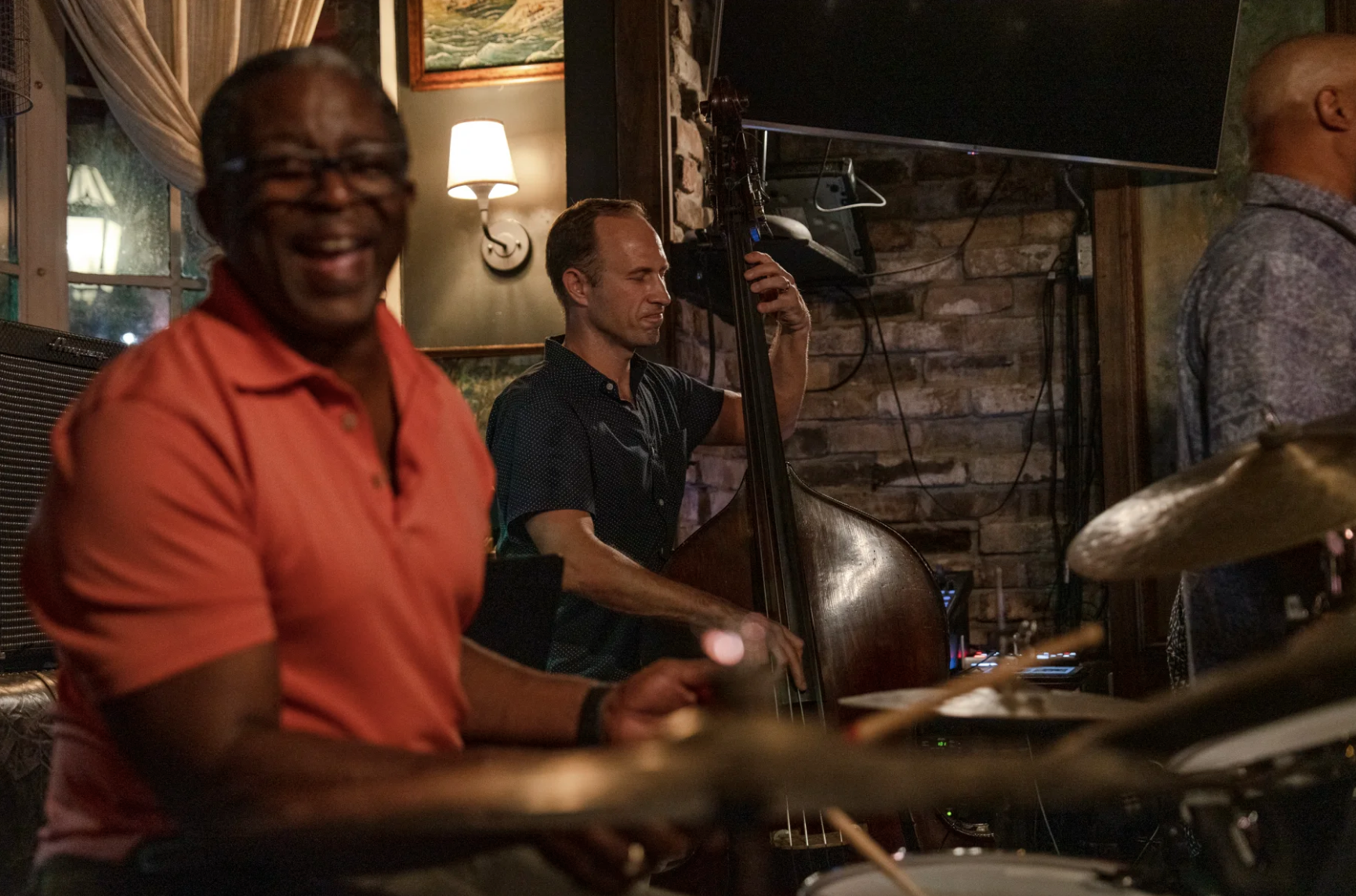 two men playing Live music - drum and bass - at Bayou Bar