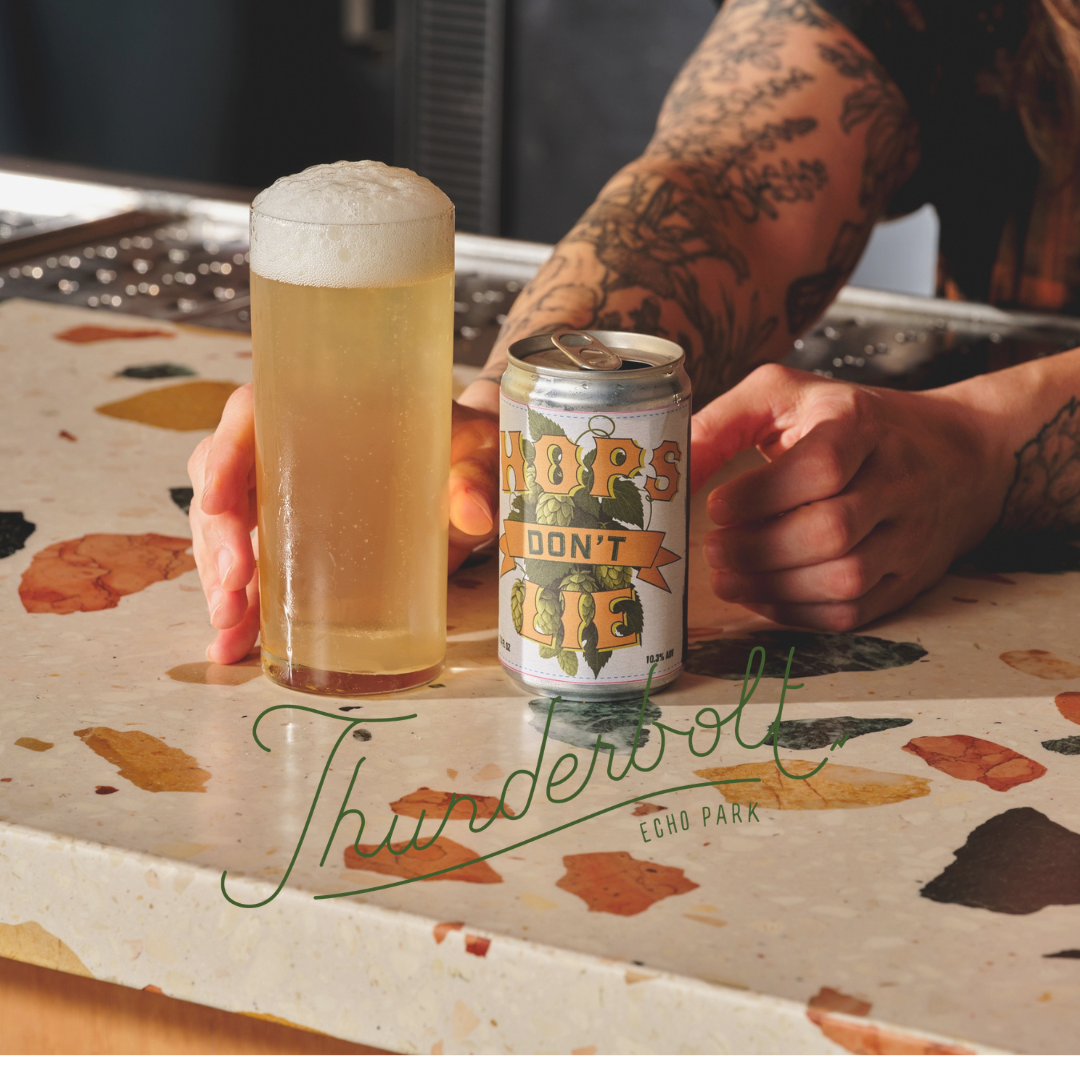 Canned Cocktail on the bar and Thunderbolt logo