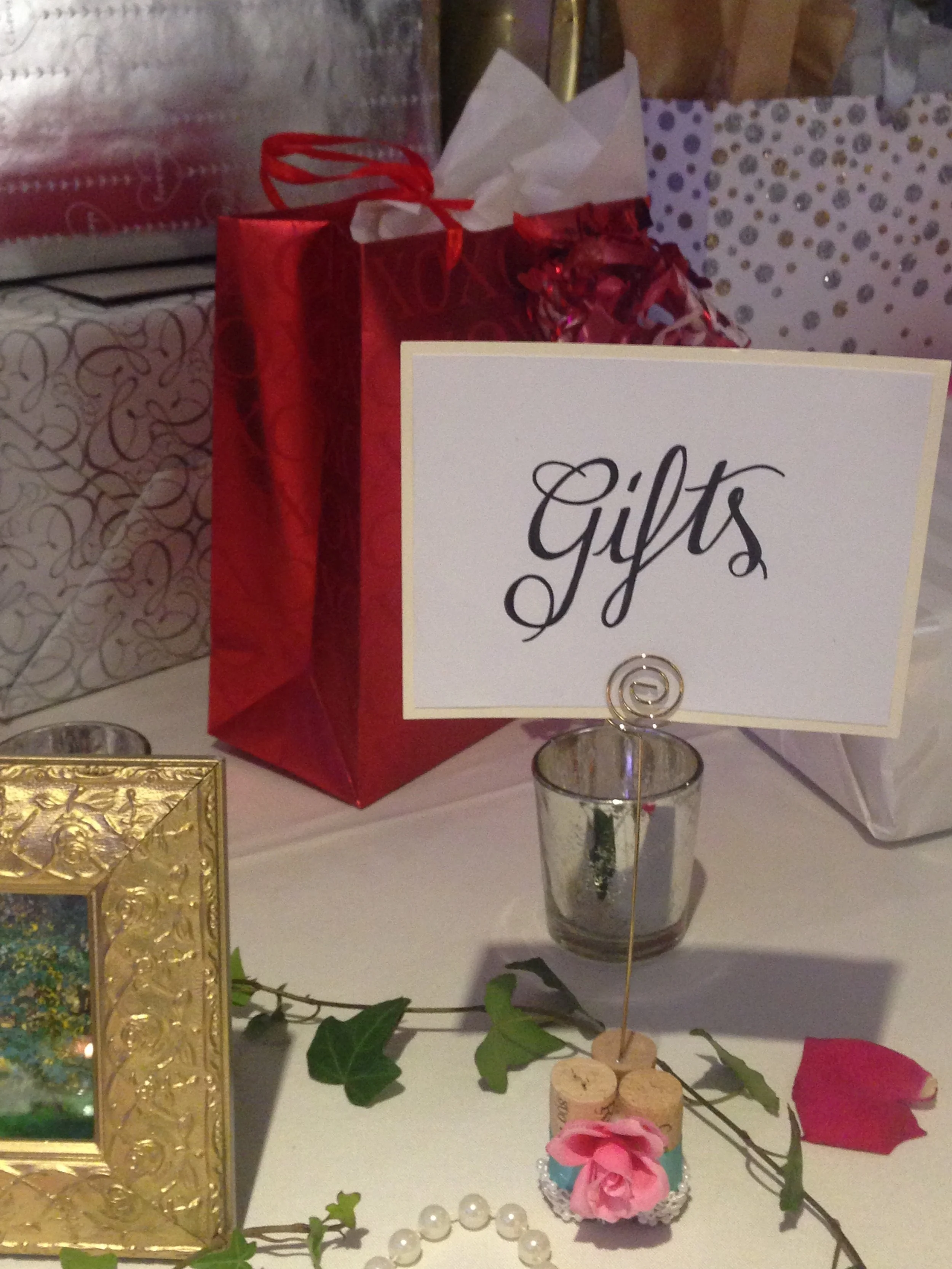 Bride's custom design for table number holders 