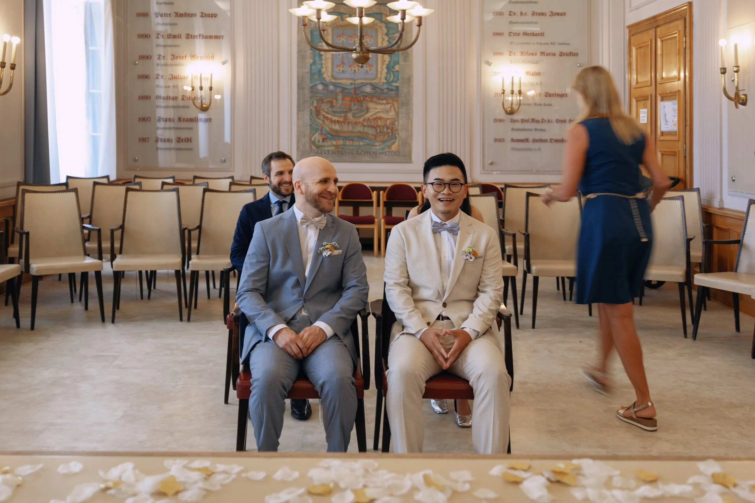 Two grooms waiting for their civil wedding ceremony to begin.