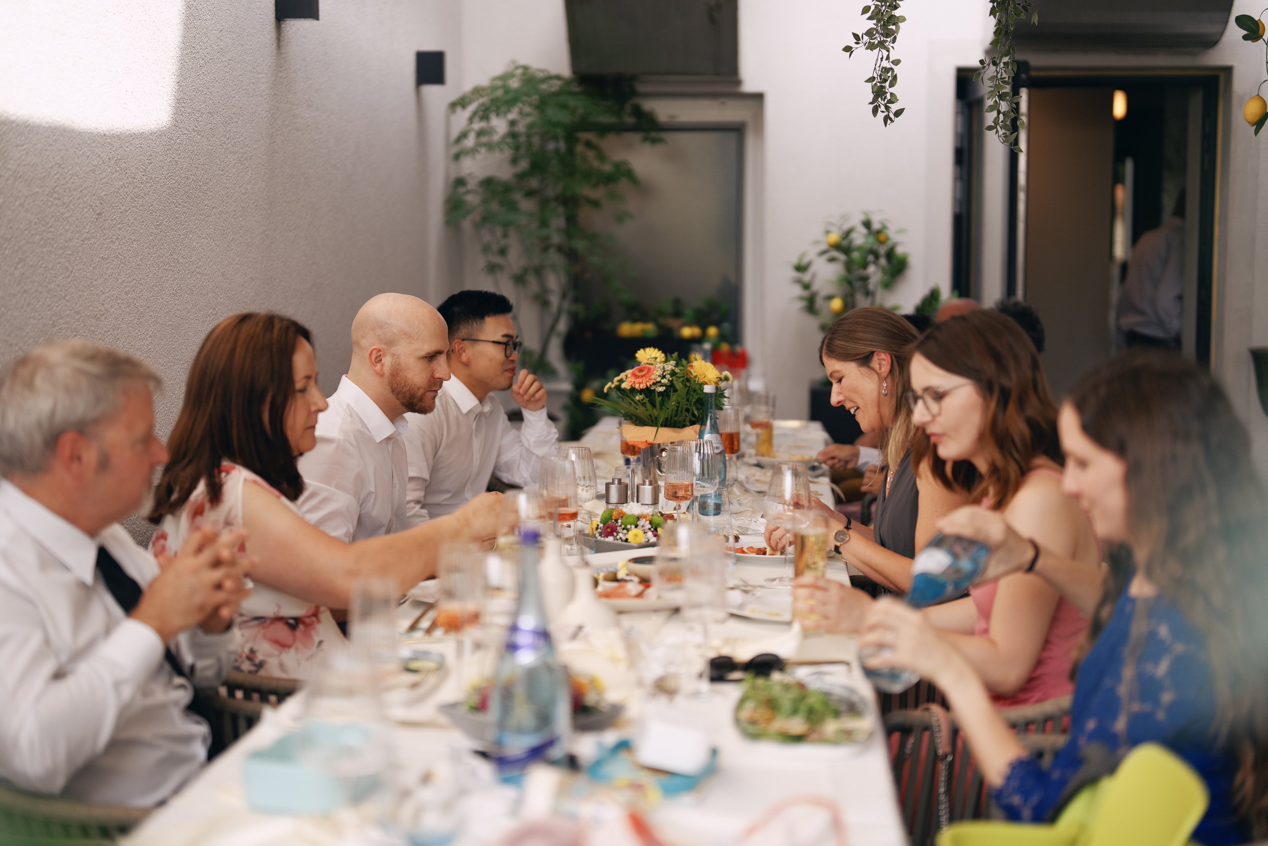 Guests enjoying dinner during the wedding reception.
