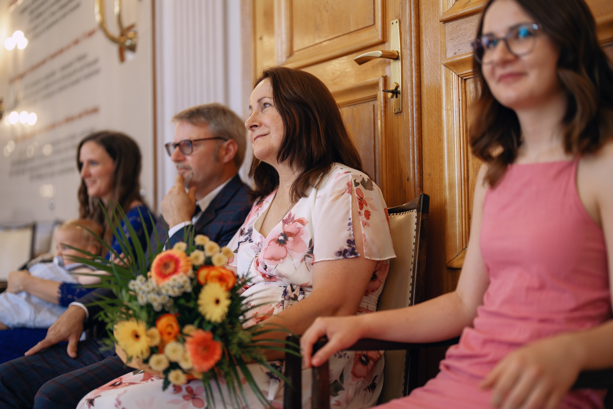 Family members watching the civil wedding ceremony.