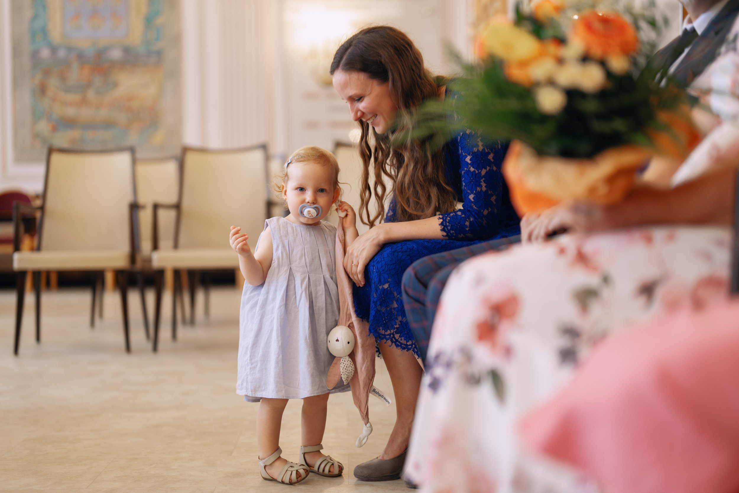 A curious little girl observing the wedding ceremony.