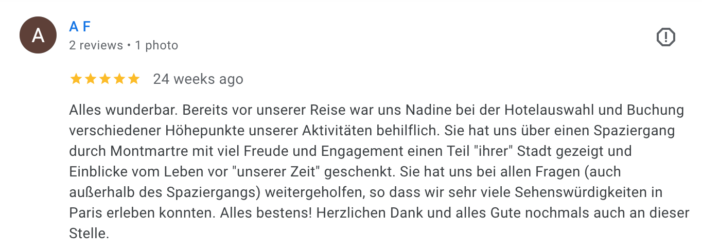 Screenshot of a German-language review about a travel experience in Paris, mentioning a walking tour through Montmartre and visits to local sights.
