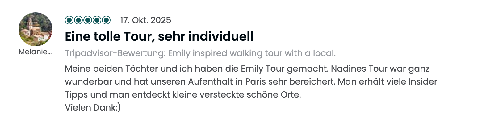 Profile picture of a hillside town with colorful buildings and a tower, in a circular frame.