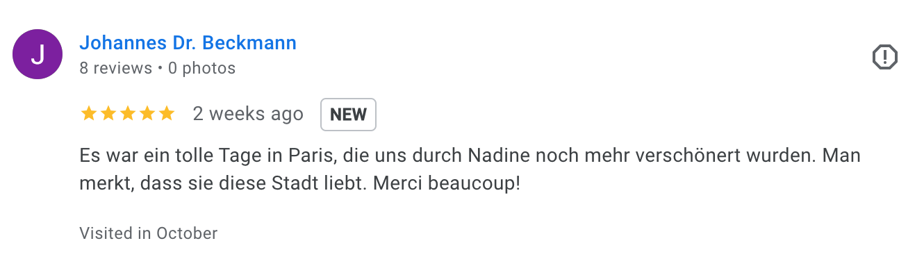 Customer review written in German about a wonderful day in Paris, mentioning that the city was more beautiful thanks to Nadine, and expressing love for the city.