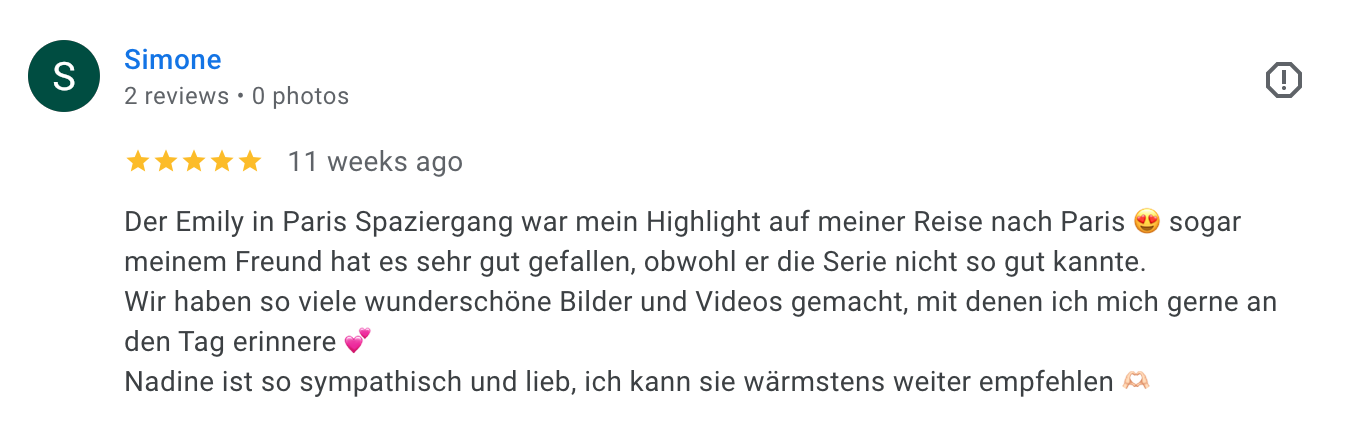 Screenshot of a positive review in German from a user named Simone, praising a series, mentioning a trip to Paris, and describing her experience with the character Nadine.