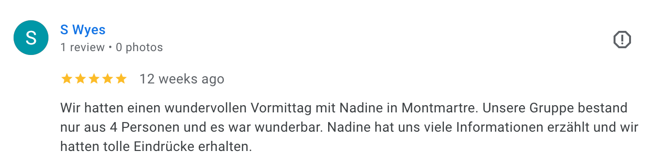 A Google review with a rating of five stars, written in German, about a morning with Nadine in Montmartre, describing a group of four people and positive impressions.