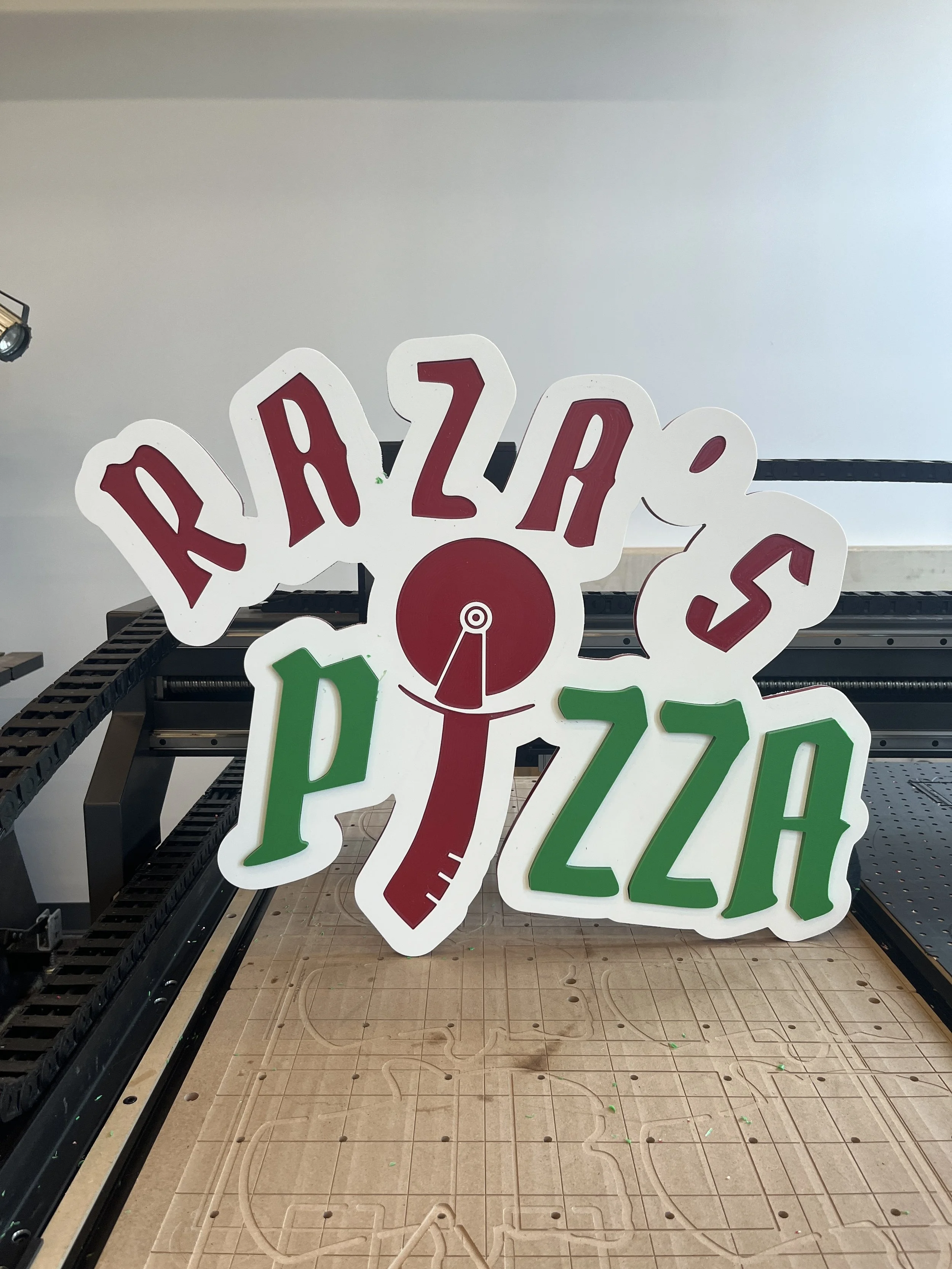 Raza's Pizza Sign