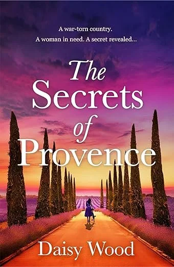 Book cover for "The Secrets of Provence" by Daisy Wood, featuring a sunset view with a woman walking down a tree-lined path.