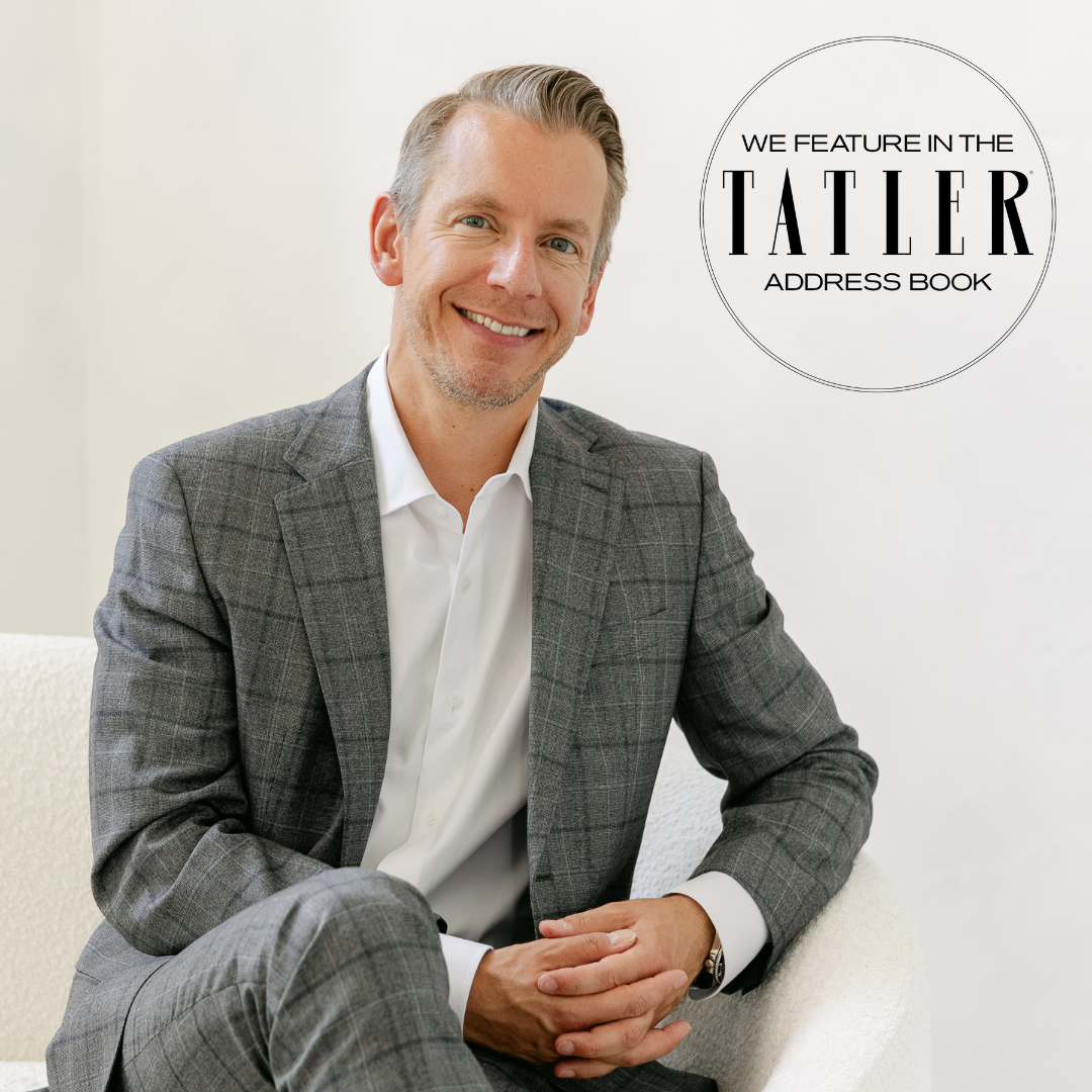 Mr Florian bast smiling sat on fluffy sofa