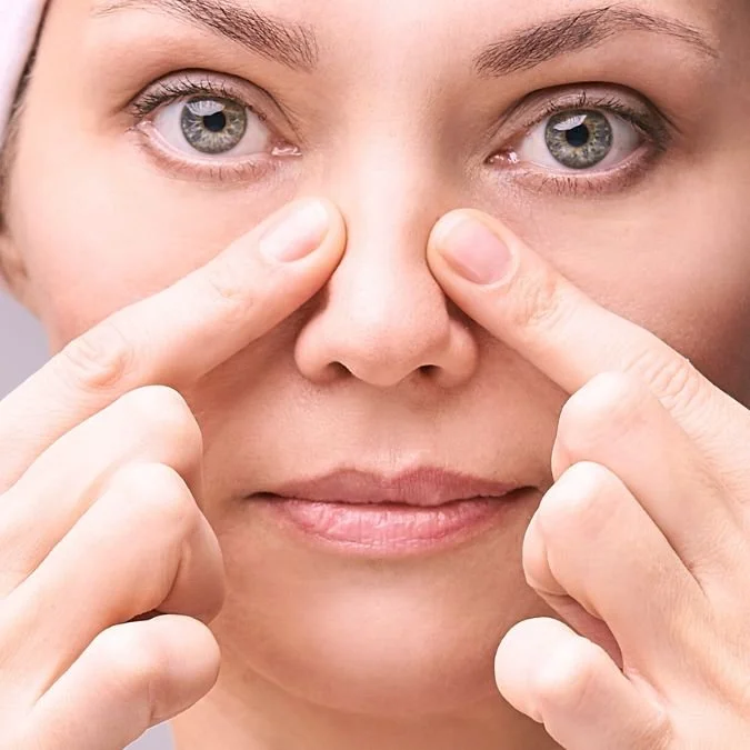 a woman who has had surgery on her crooked nose