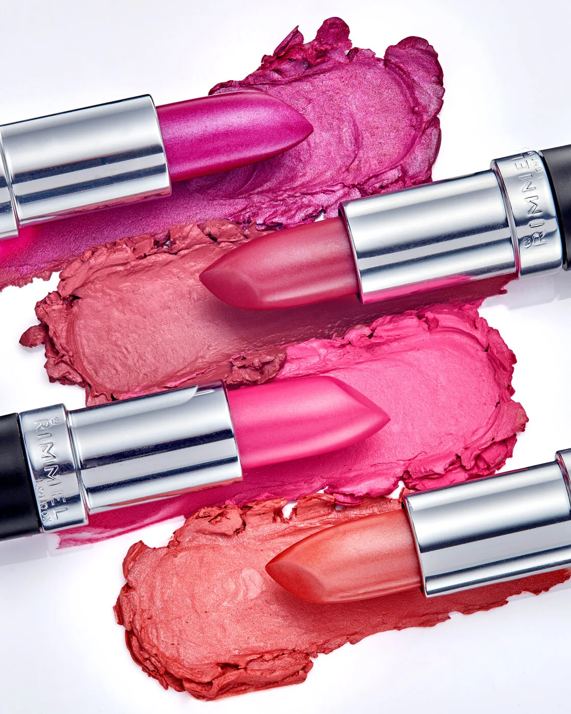 lipsticks beauty product photographer lipstick beauty products styled as a beauty lipstick crush, swatch of each colour and lipstick on top. Product photographer Chris Howlett shoots still life (Copy)