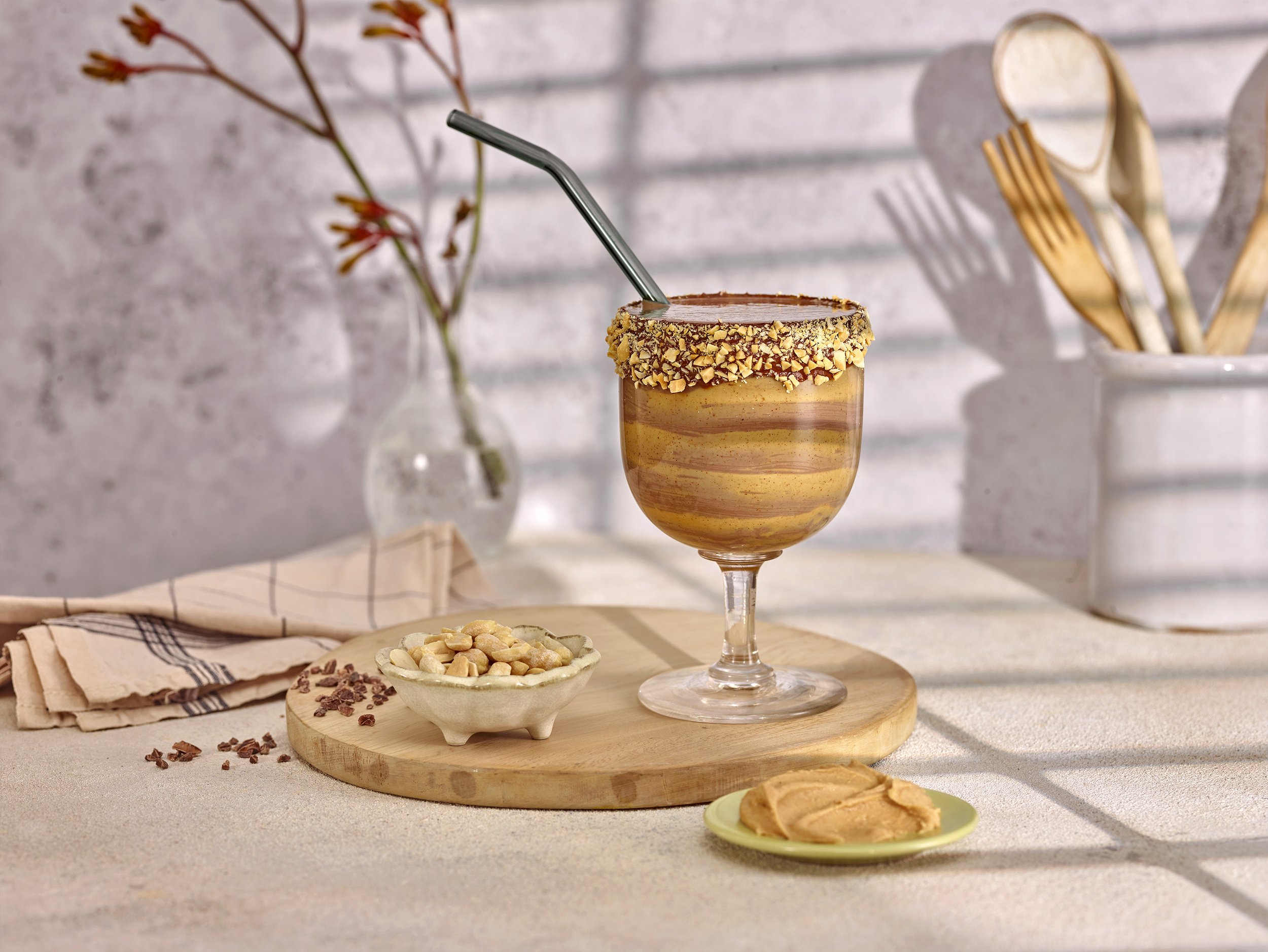 Drinks photography morning protein drink in kitchen with window through light 
