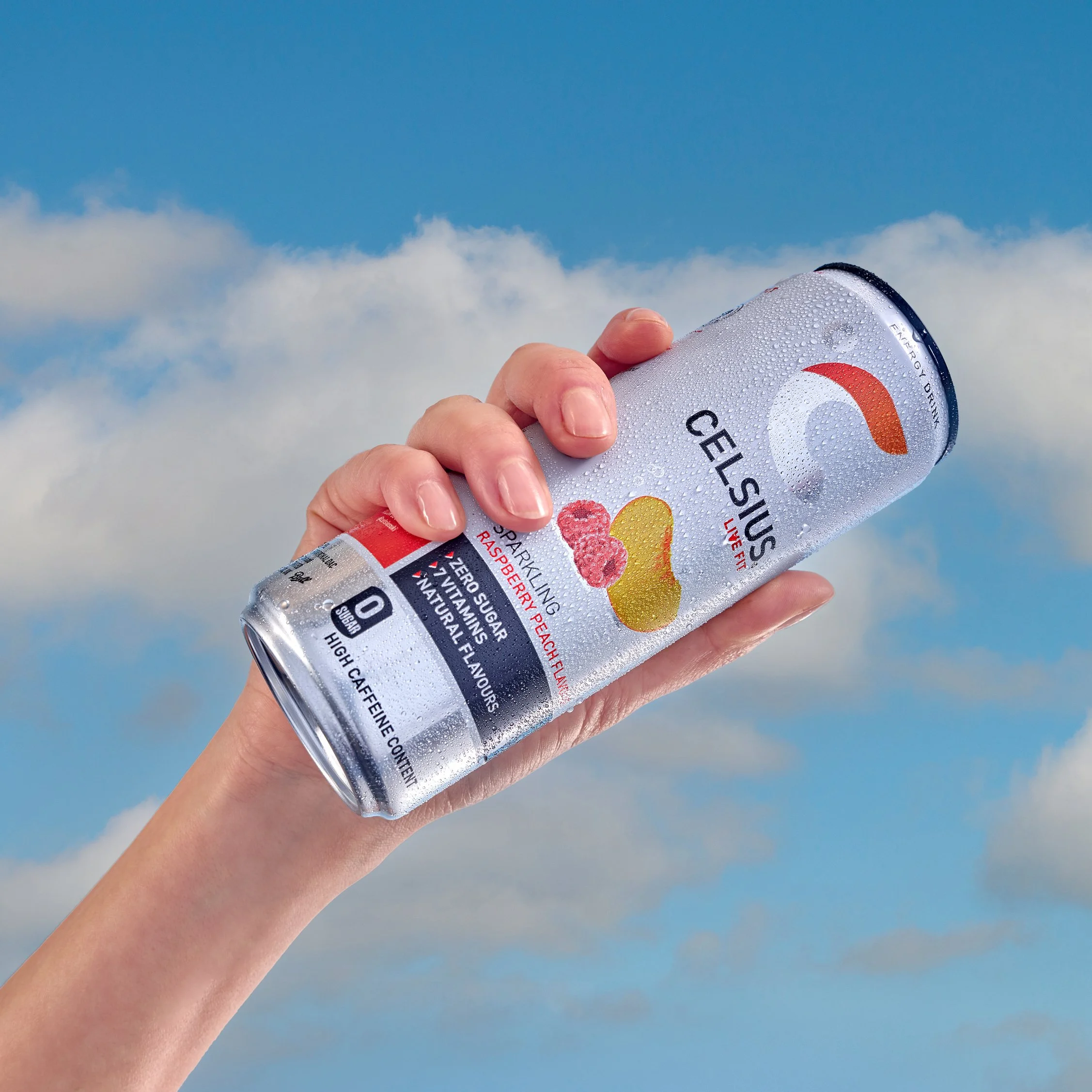 model hold can aloft in the sky hero the beverage shot in London location