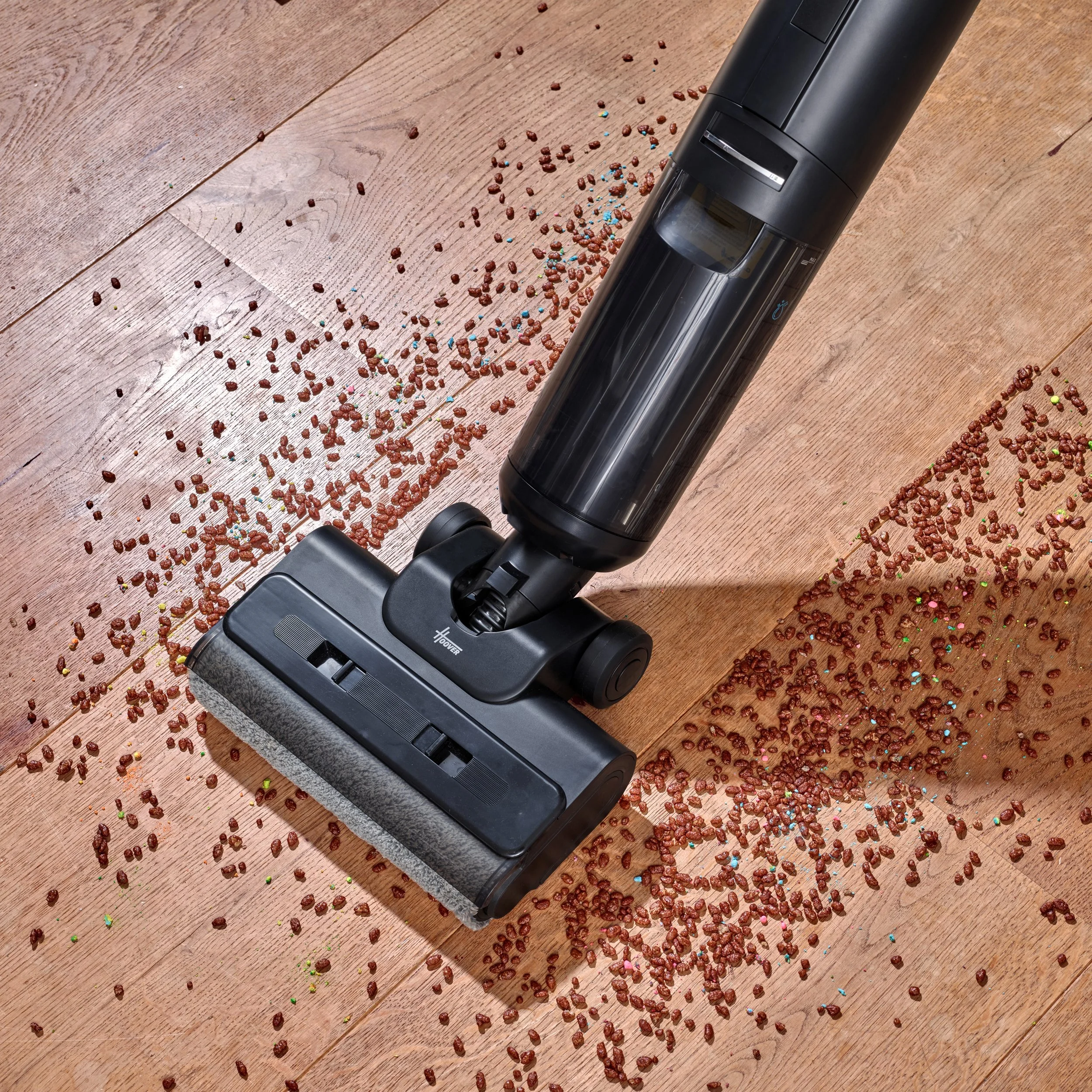 mop running against the floor in kitchen environment. Classic product photography on location