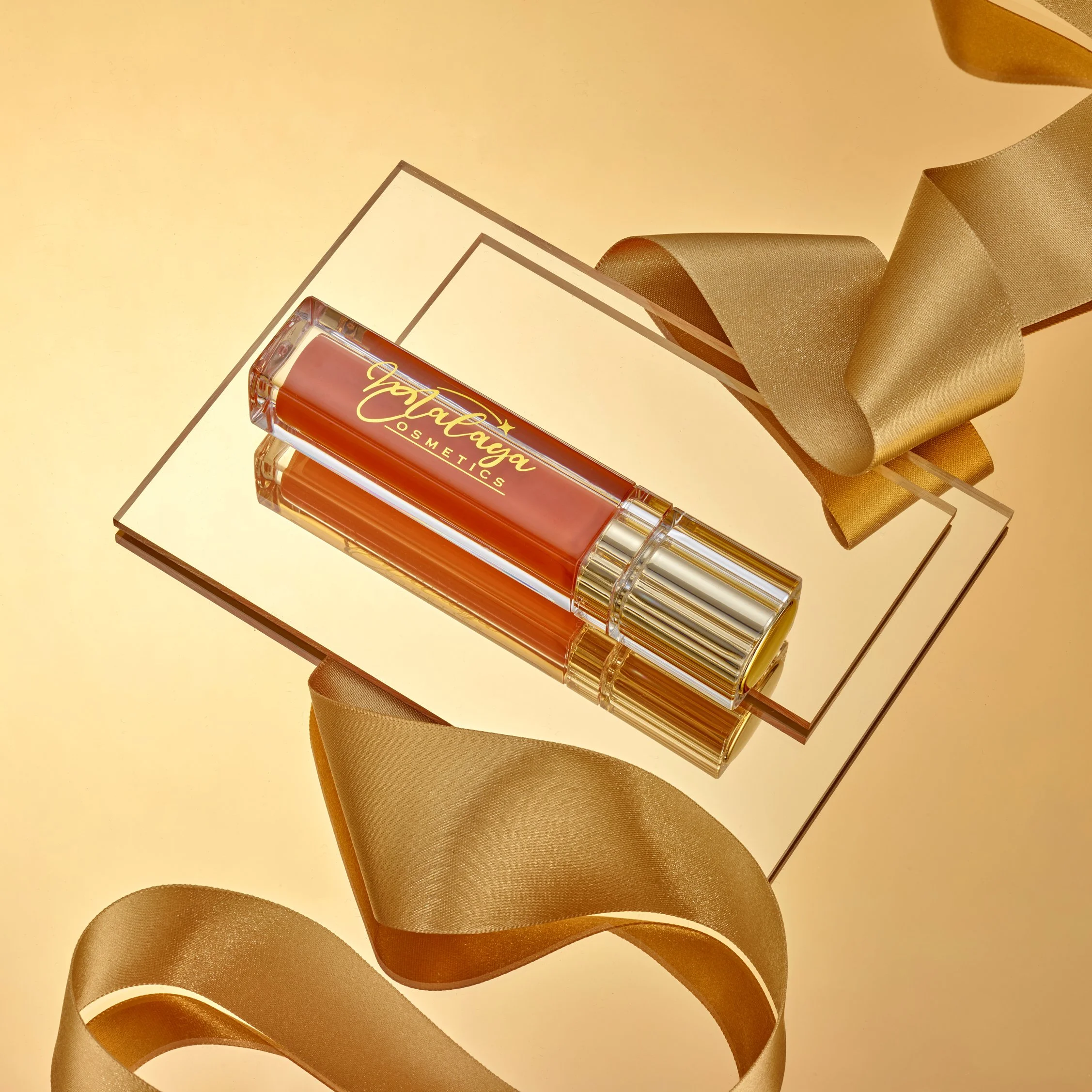 Gold cosmetics creative product photography lip gloss 