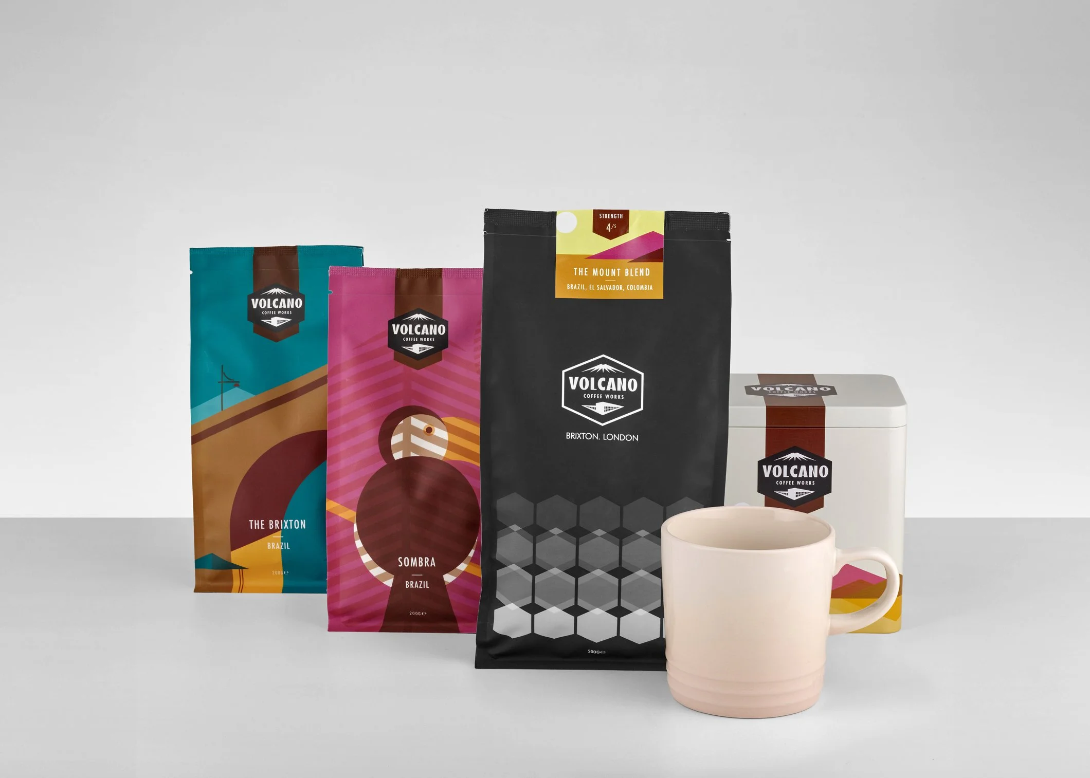 product pack shot coffee product lined up simple tray background 