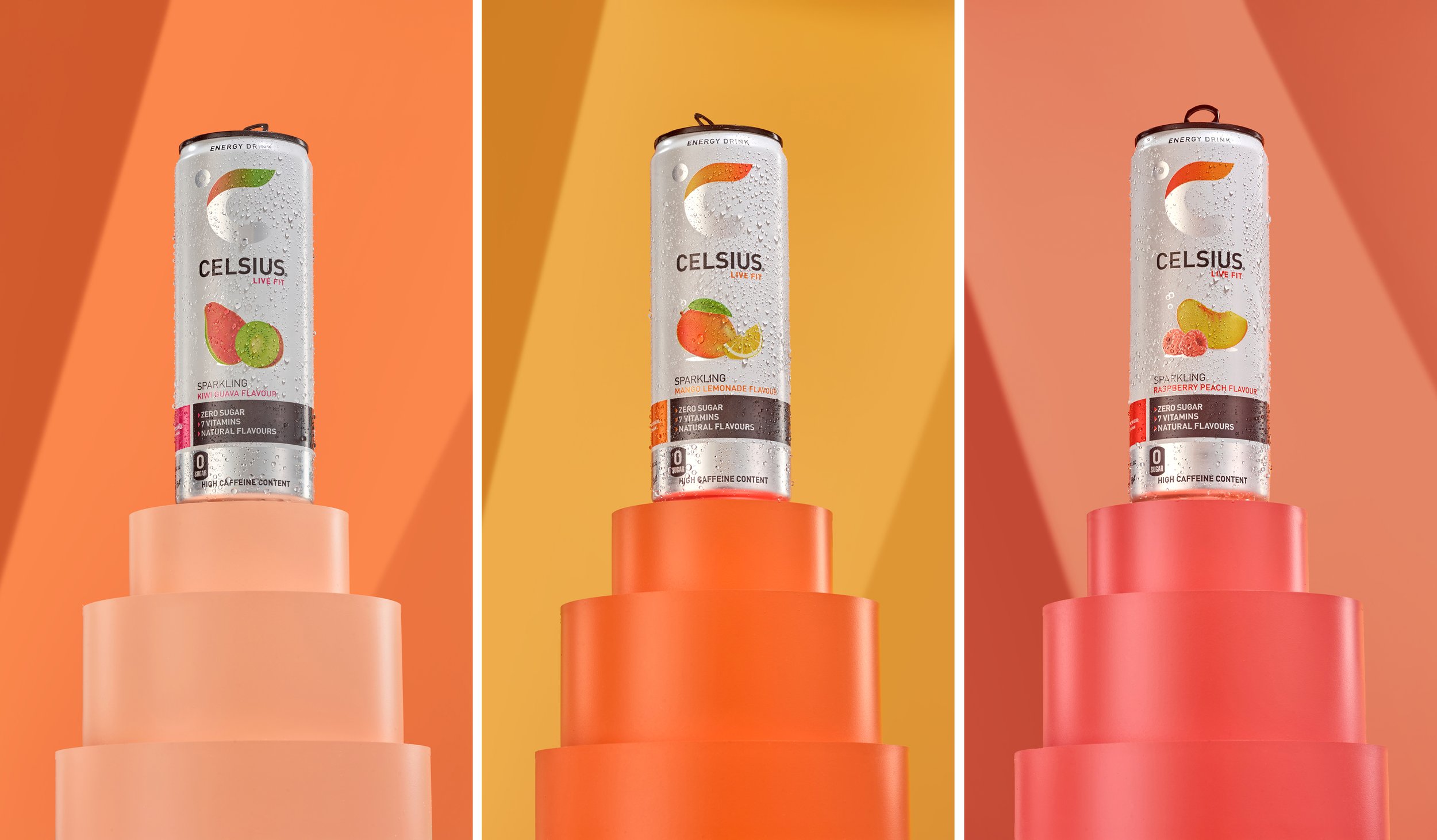 colourful set of three cans on plinth with bright background that reflect the ingredient in the drinks can. food photographer Chris Howlett