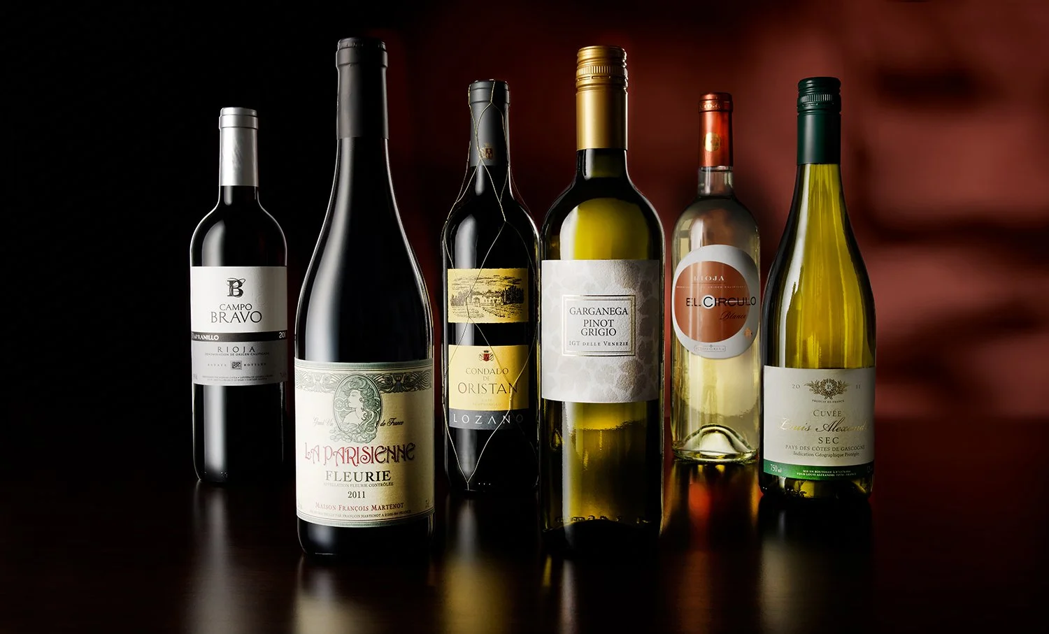 collection of wine bottles creatively photographed