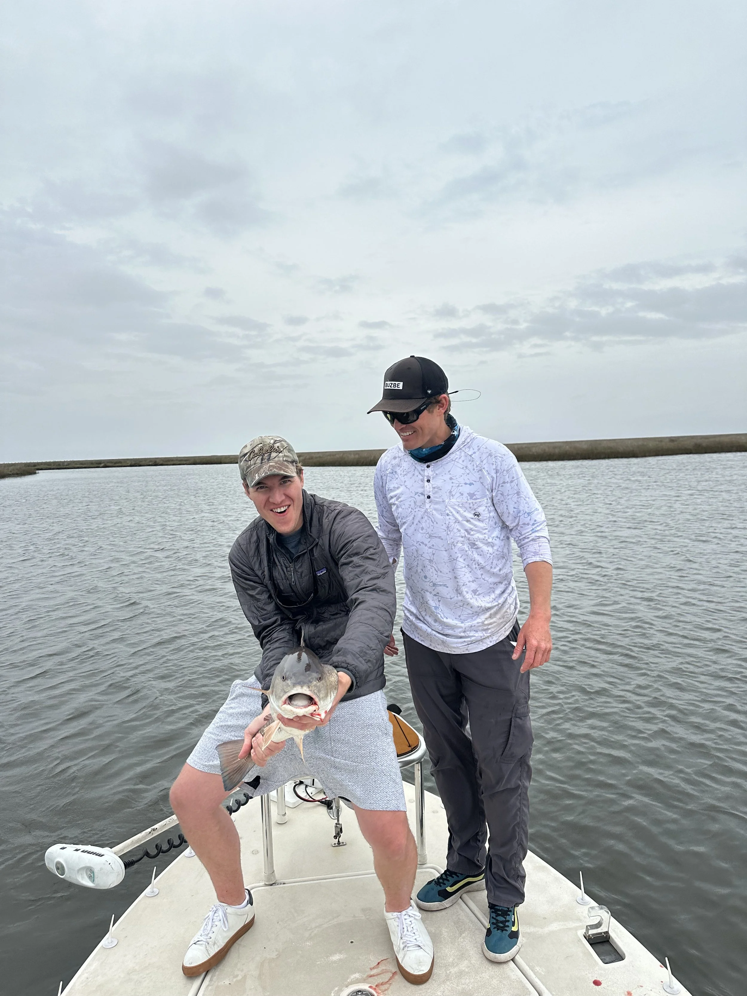 Louisiana fly fishing guide with redfish catch