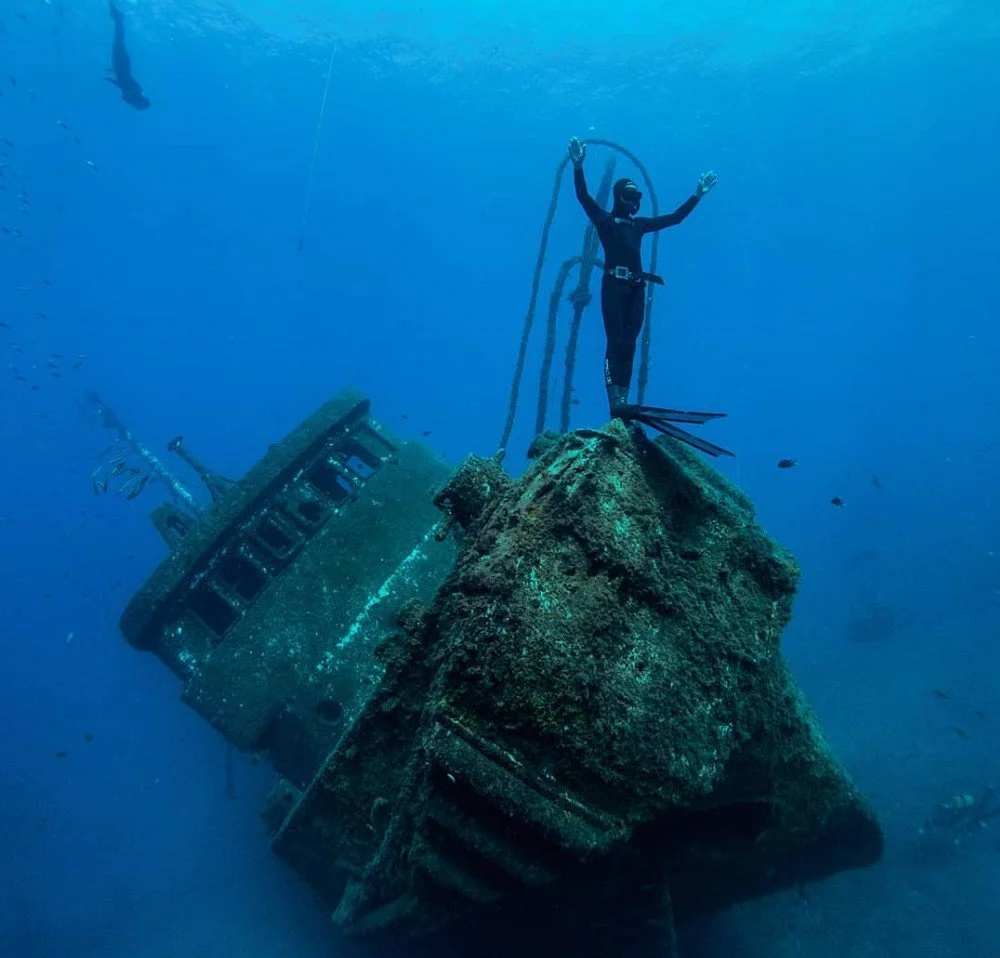 A Freediver standing on the Wreck in Tabaiba Tenerife