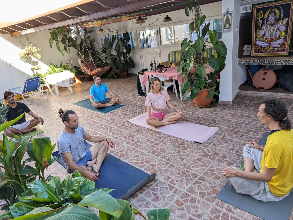 A yoga class with 4 students  lead by Jeremy from Oceanflow freediving in Tenerife