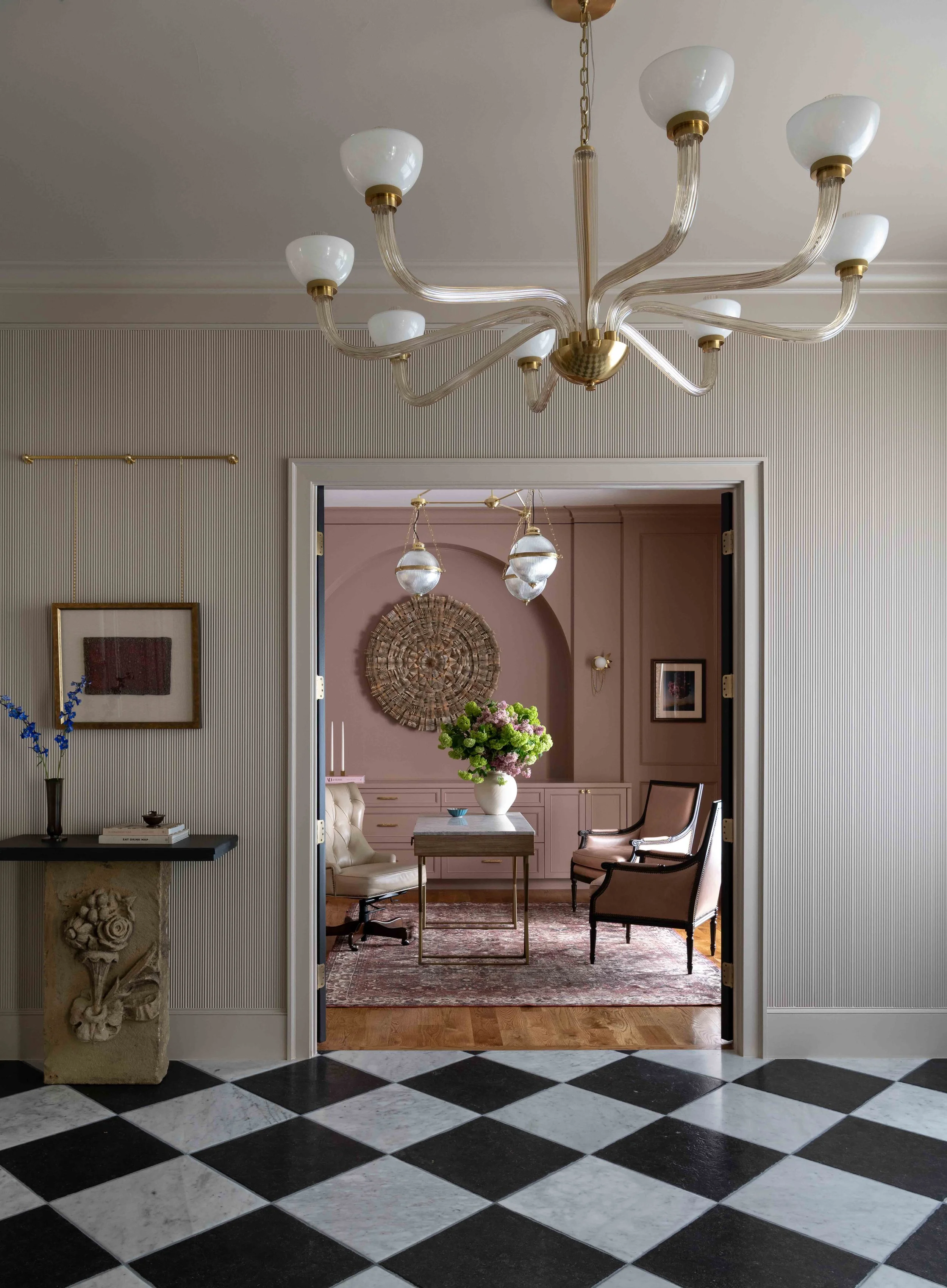 Welcoming entry foyer with statement lighting in 3304 Hidden Trail luxury home.